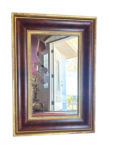 Early 19th Century American Empire Mahogany and Gilt Ogee Wall Mirror.