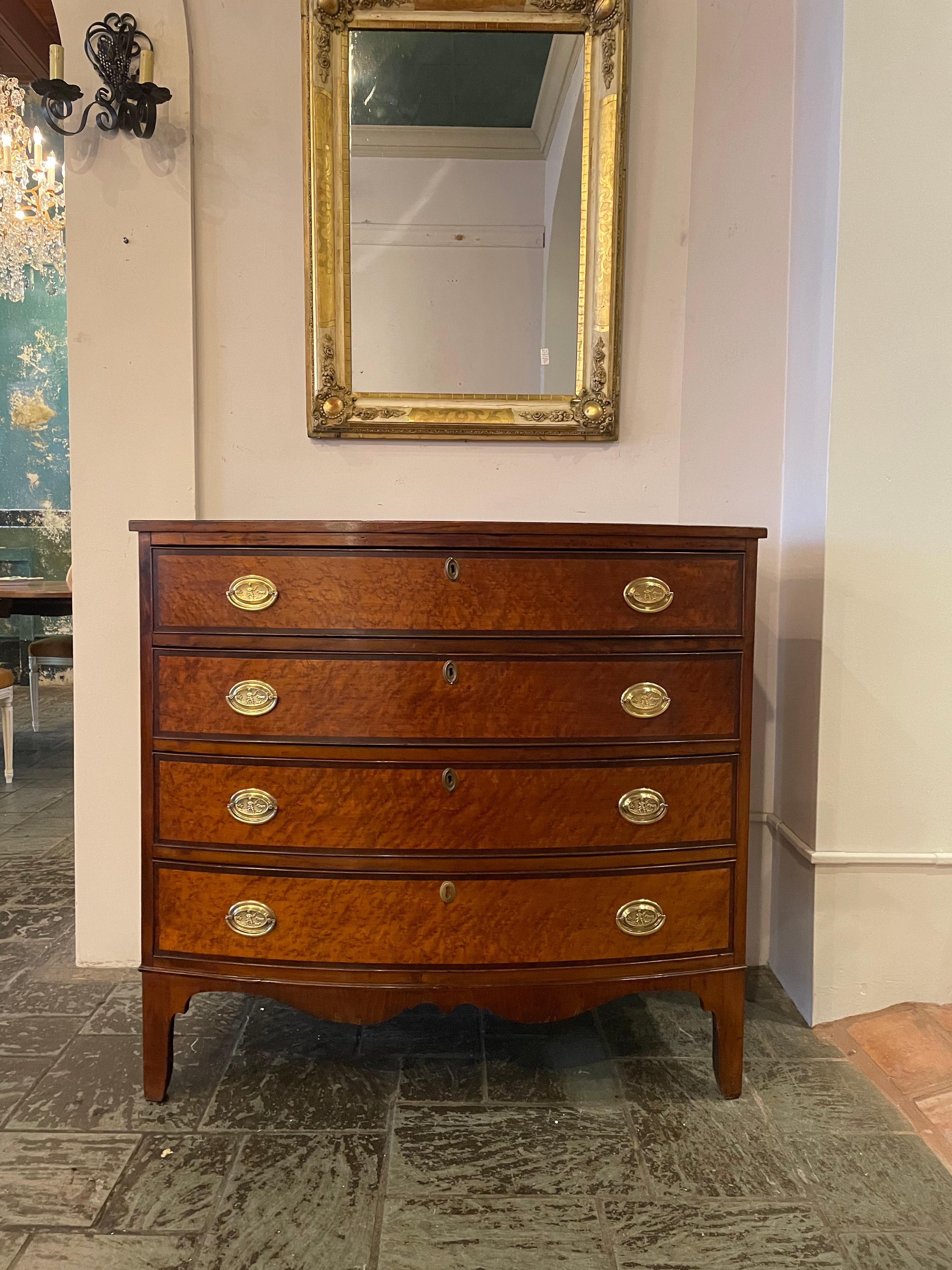 Early 19th century American figured mahogany bow front chest.