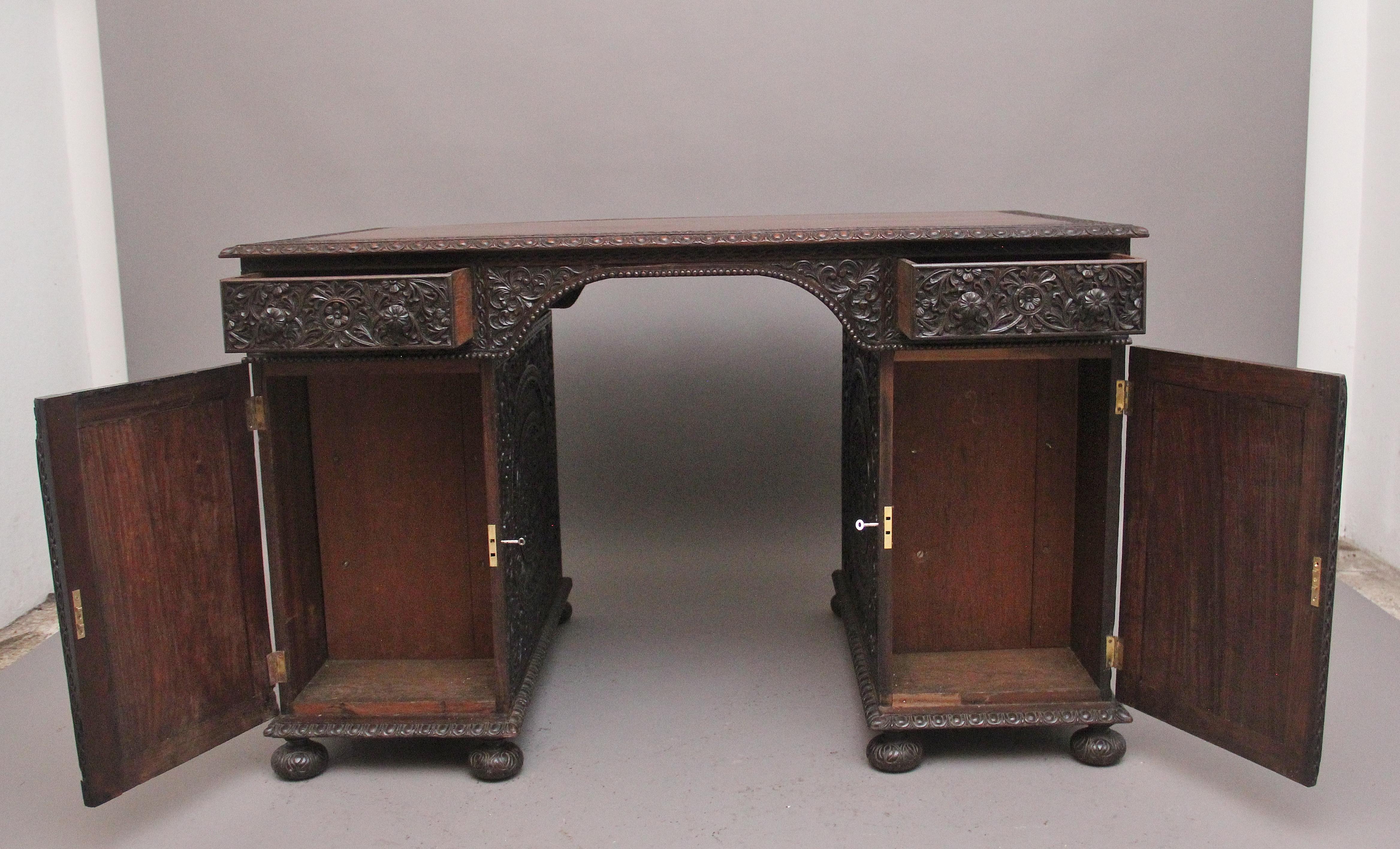 Padouk Early 19th Century Anglo-Indian carved partners desk For Sale