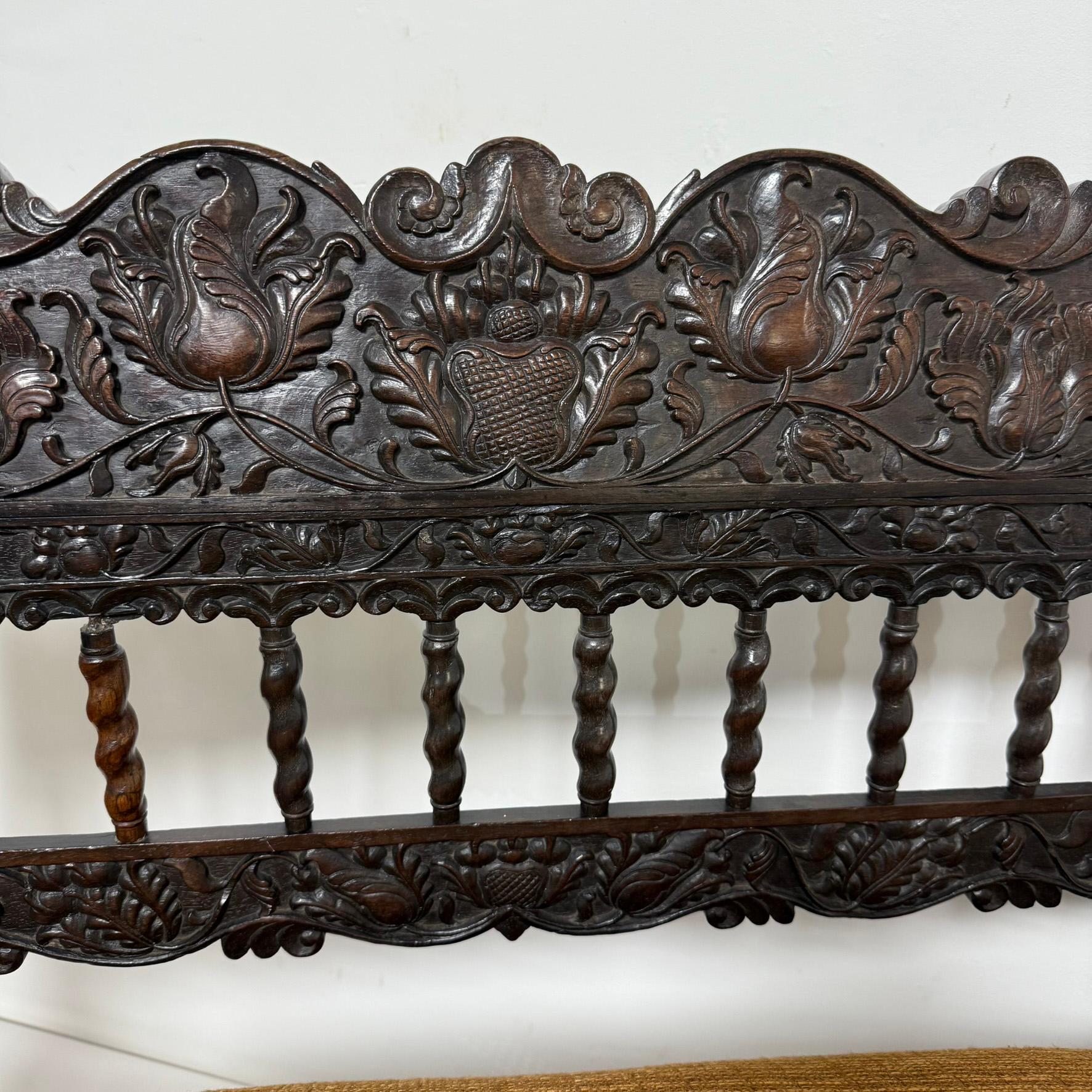 Early 19th Century Antique Anglo Indian Caned Seat Settee in Carved Ebony In Good Condition For Sale In Peabody, MA