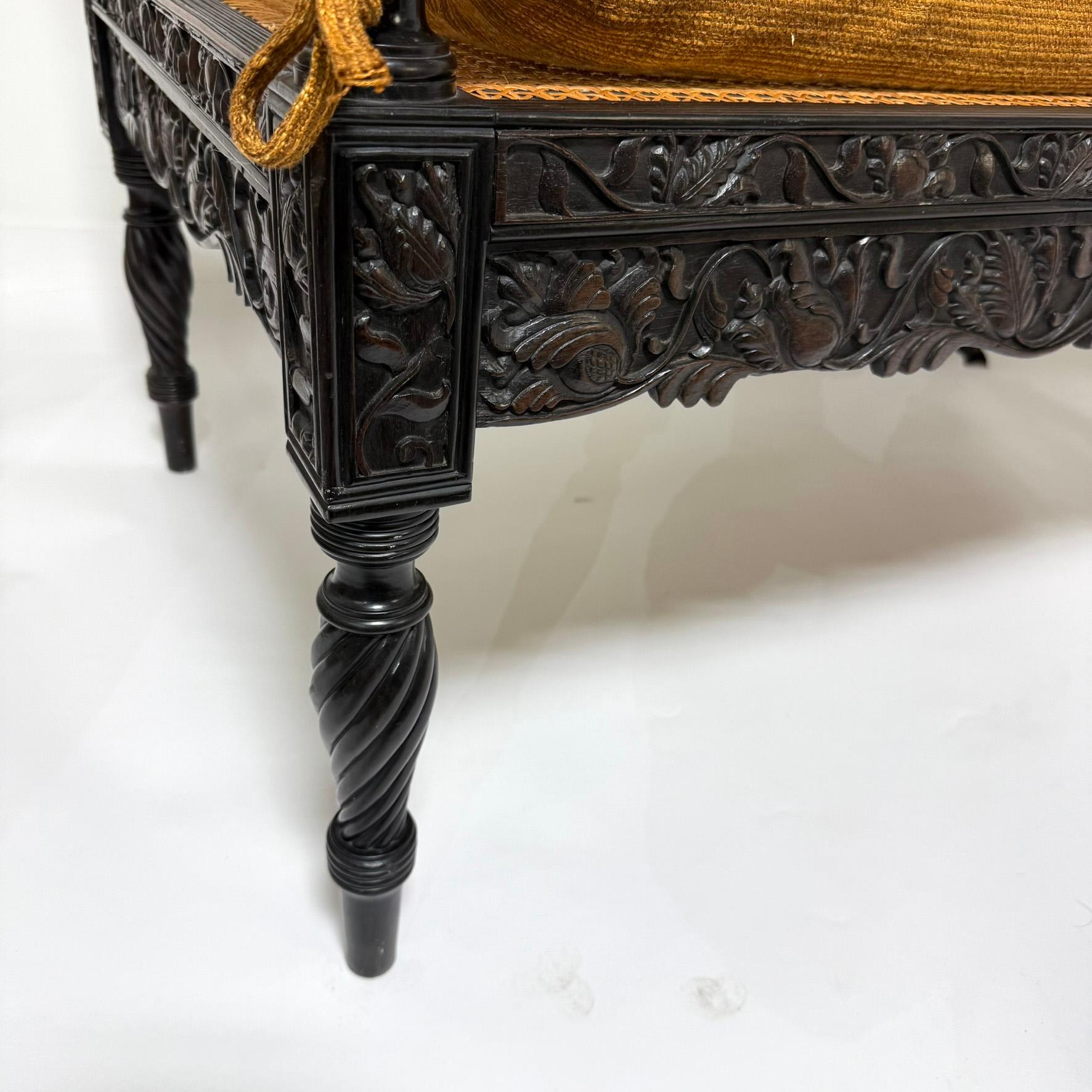Early 19th Century Antique Anglo Indian Caned Seat Settee in Carved Ebony For Sale 1