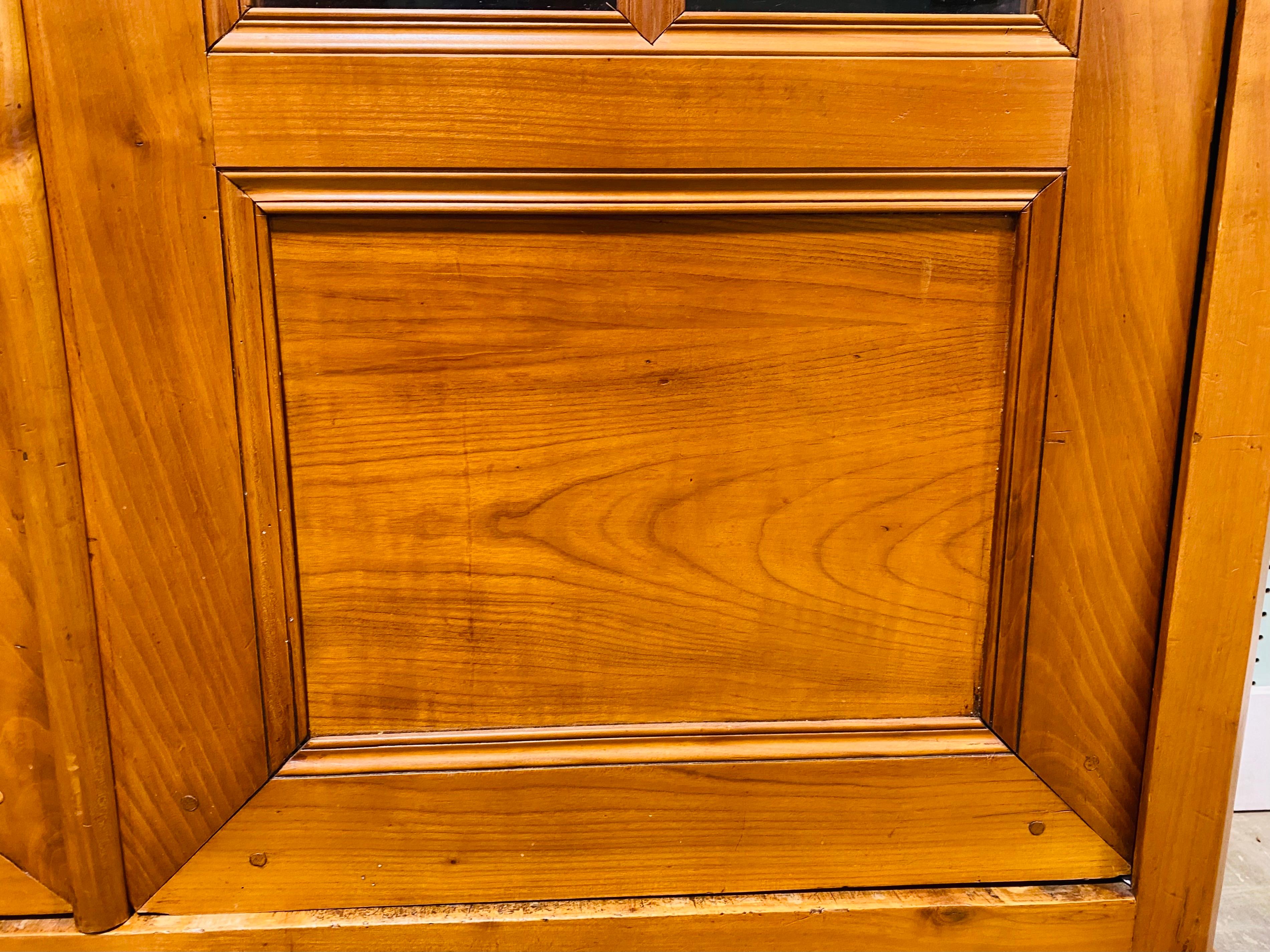 Wood Early 19th century antique French country Cherrywood cabinet/bookcase For Sale