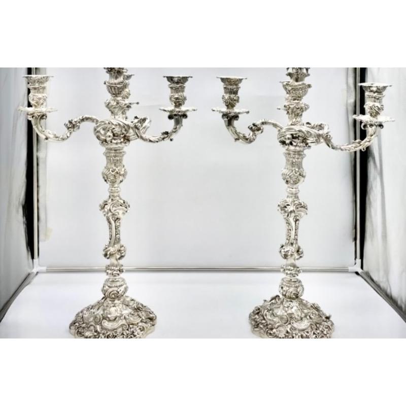 Early 19th Century Antique George IV Silver Pair Cast Candelabra London 1825 by Craddock and Reid.

A truly fine and incredibly large pair of four light cast sterling silver candelabra decorated with exquisite floral and scrolling motifs.  
The