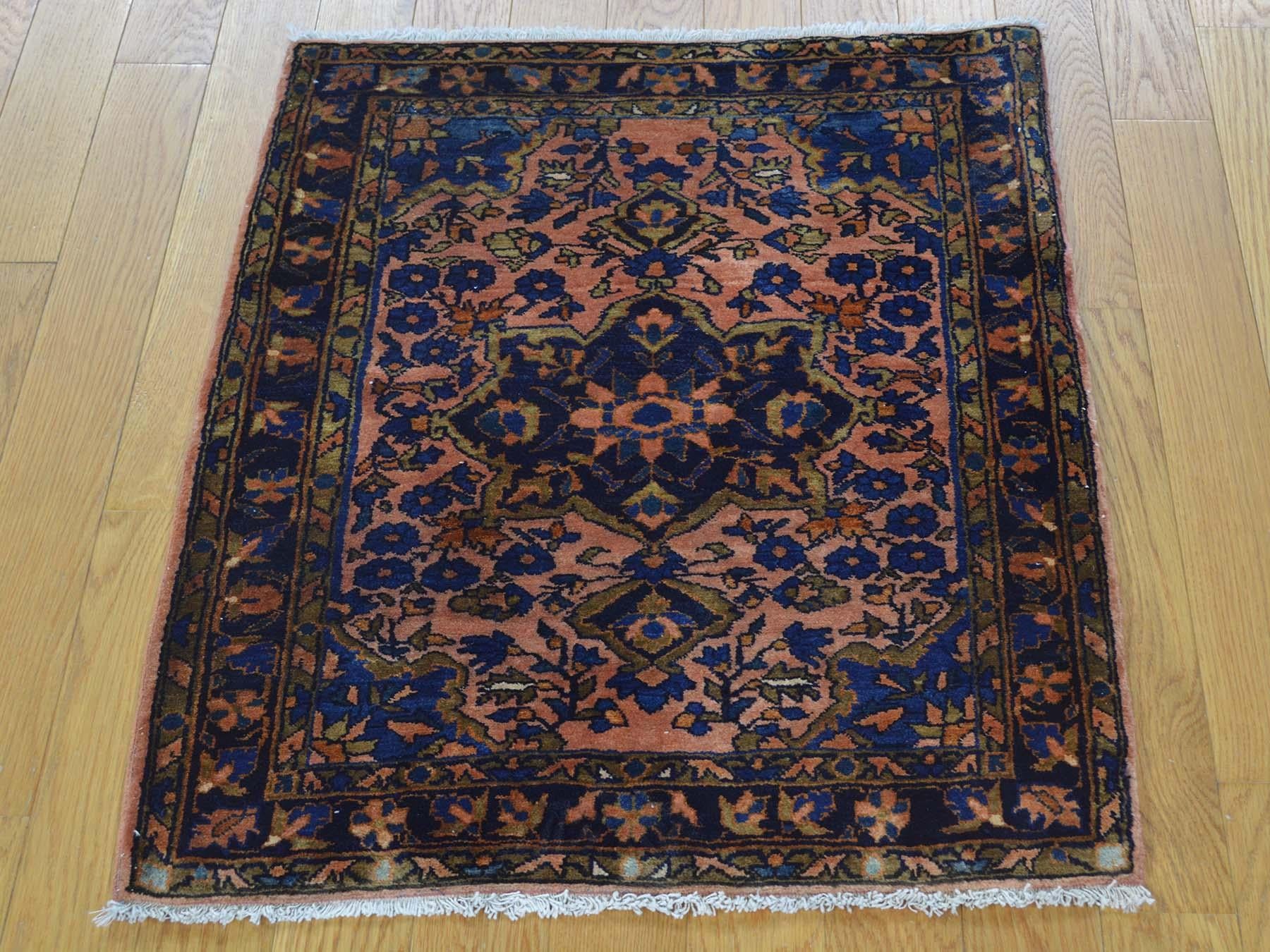 Revive your home style with this beautiful antique carpet. This handcrafted Persian mohajeran Sarouk, is an original full pile soft and clean oriental rug. This rare piece has been knotted for months and months in the centuries old traditional