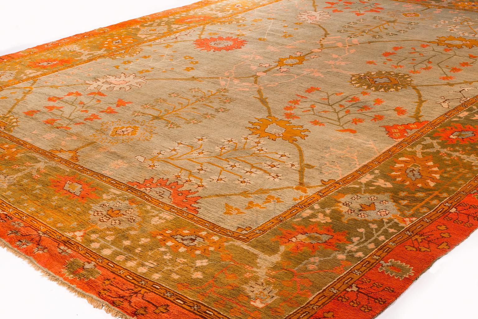 This antique Turkish Oushak (Ushak) rug represents the very best of its type. 'Oushak' refers to rugs which use a particular family of designs, called after the city Usak - one of the larger towns in Western Anatolia, which was a major centre of rug