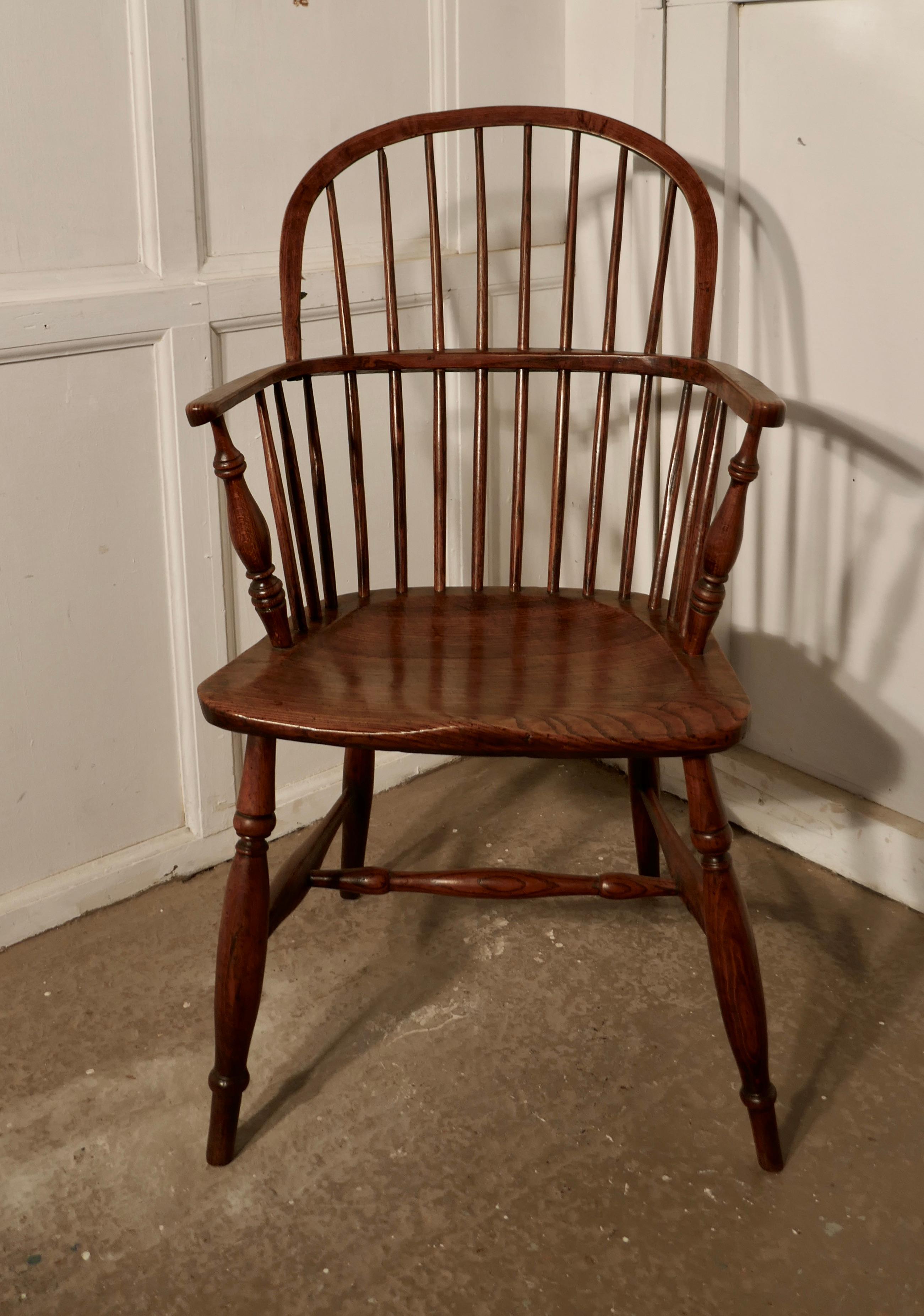 Early 19th century ash and elm hoop back country carver chair

This is an early 19th century chair with an elm seat, it has a hooped back in the traditional Windsor style with a saddle seat, turned front legs and stretchers

This lovely country