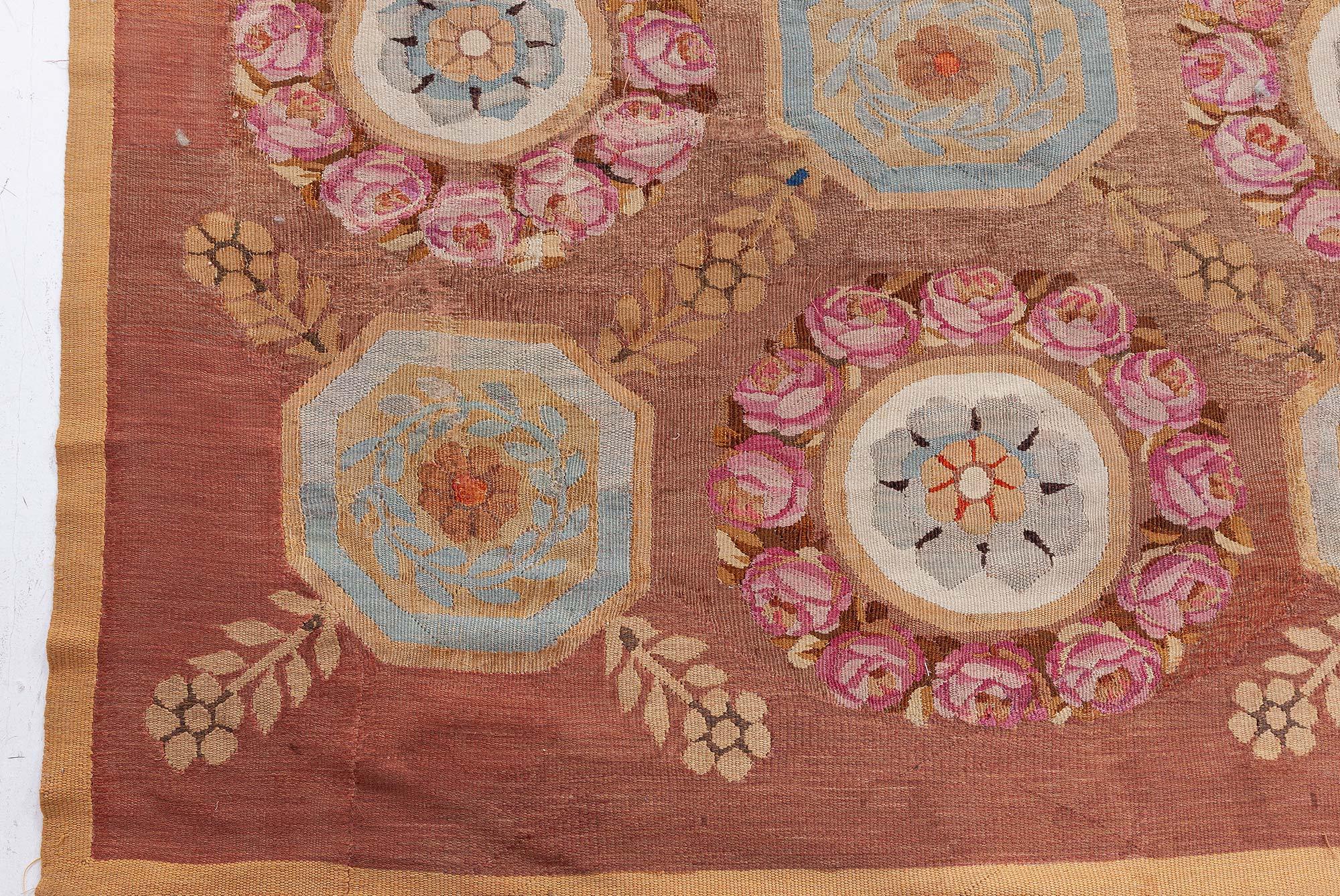 Early 19th century Aubusson brown handmade wool rug
Size: 13'7