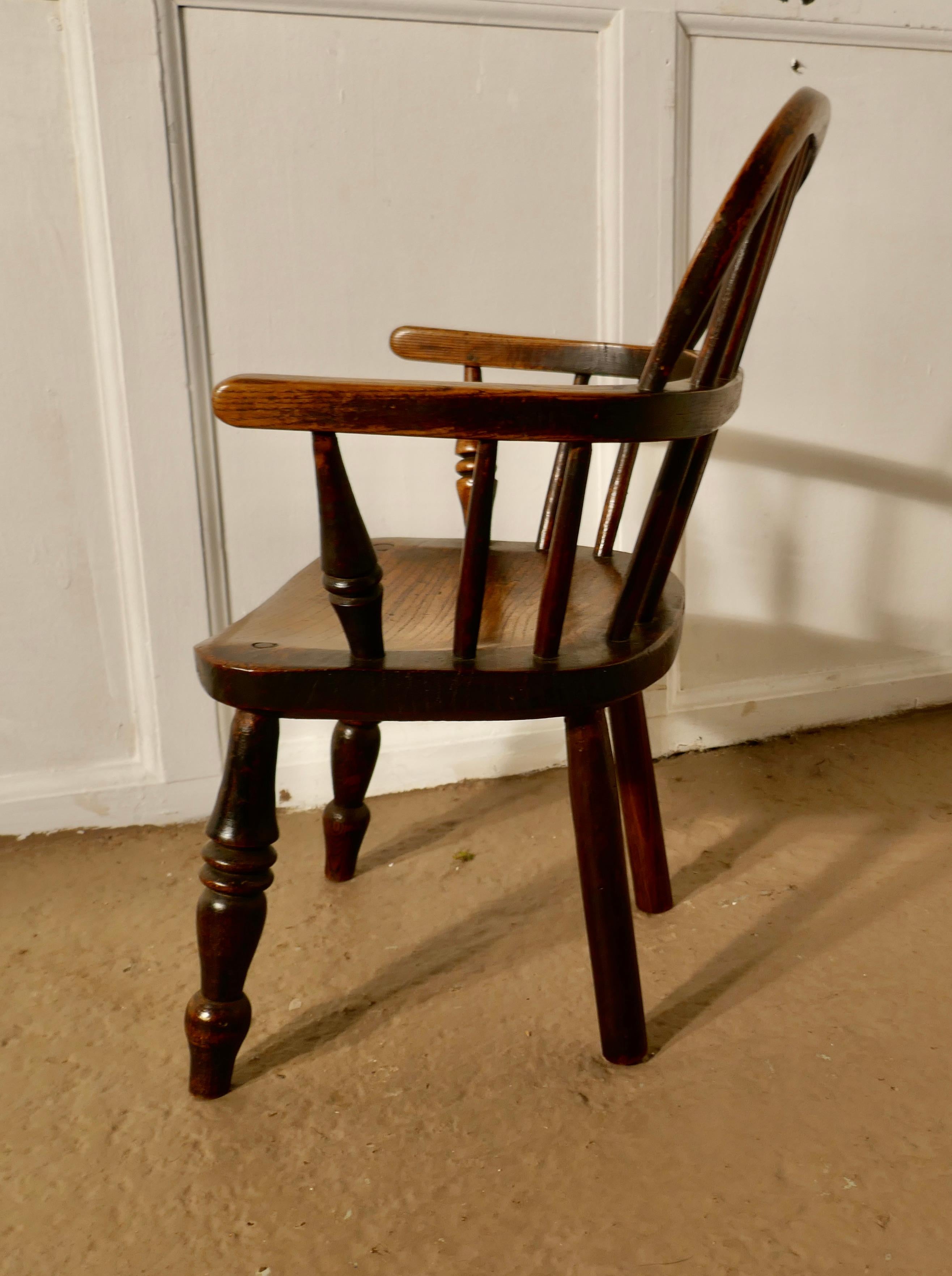 Early 19th century beech and elm childs country carver chair


This is an early 19th century chair with an elm seat, it has a hooped back in the traditional Windsor style with a saddle seat and turned front legs
Unusually the back legs are