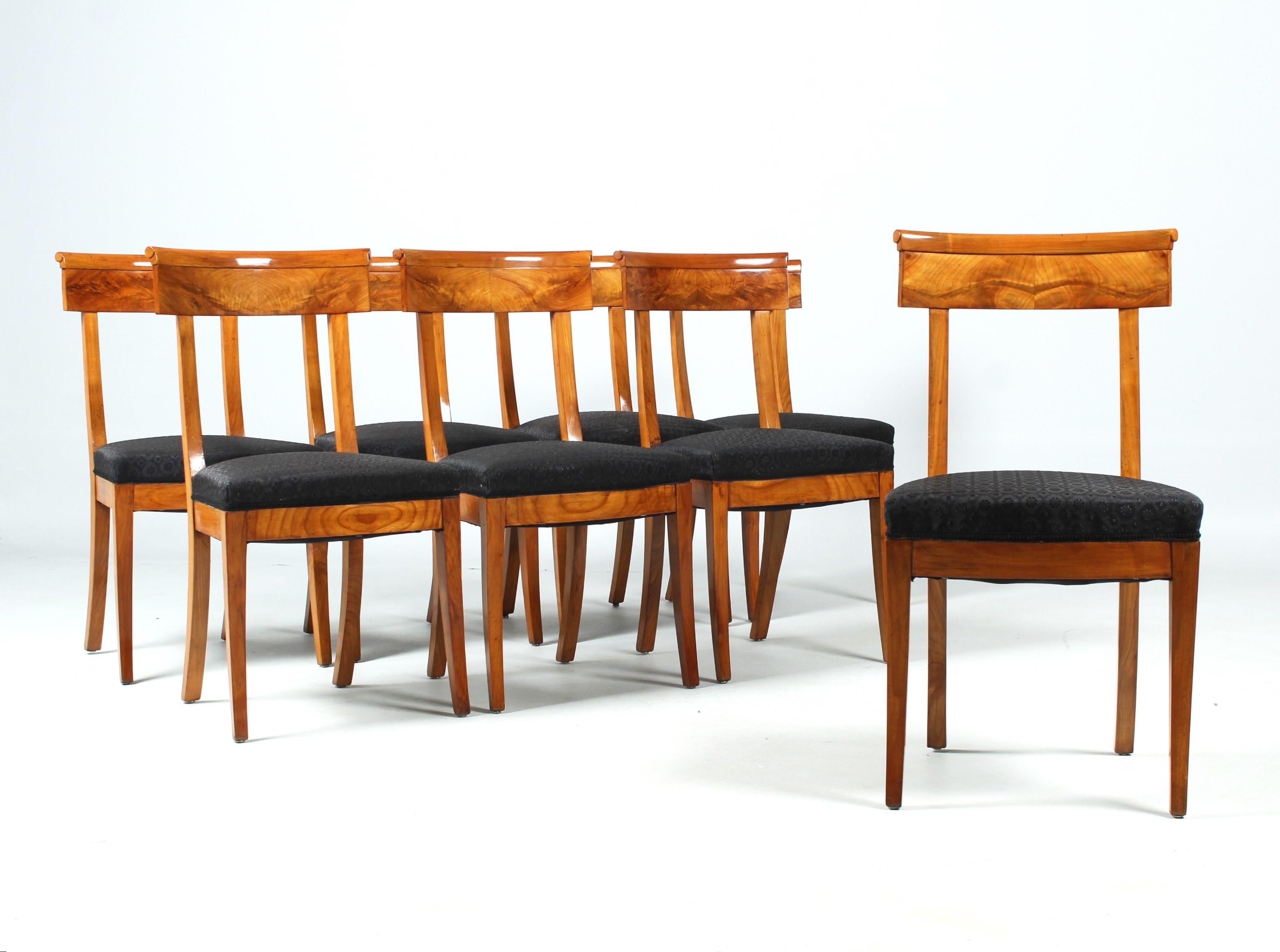 Eight identical antique Biedermeier chairs in cherry wood
West Germany / France
Cherry tree
Biedermeier around 1820

Dimensions: H x W x D: 88 x 46 x 47 cm Seat height: 47 cm

Description:
Beautiful and authentic set of eight identical