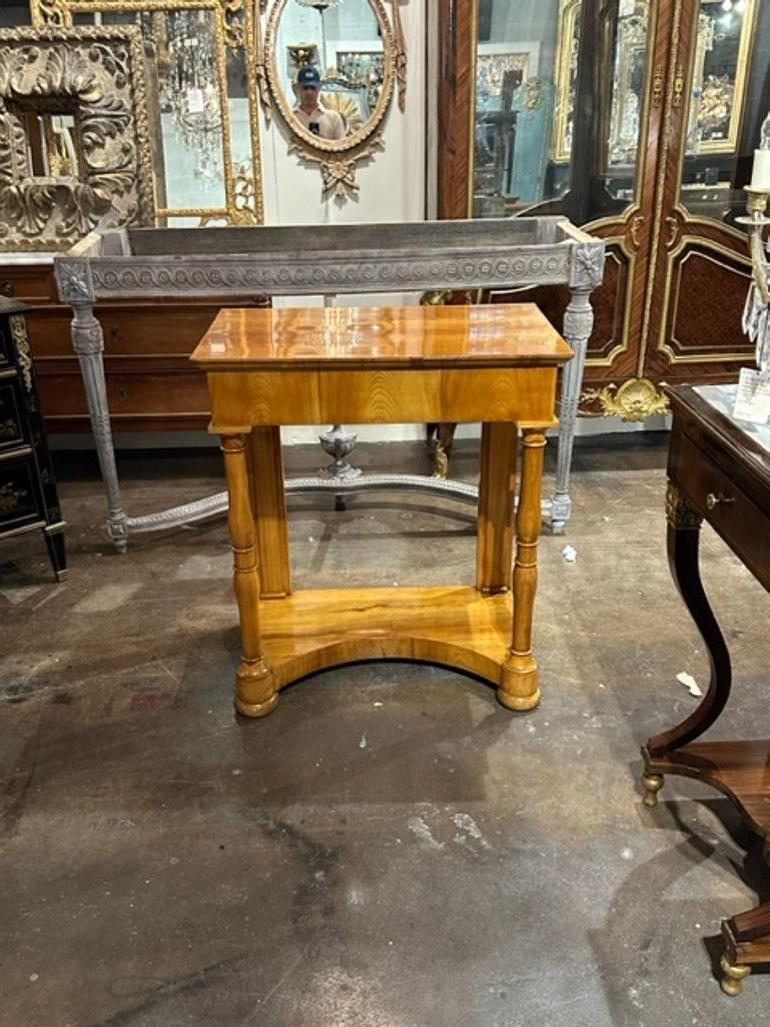 Very fine period German Biedermeier cherrywood console. Beautiful classic lines and a gorgeous polished finish. A fabulous addition to any home!