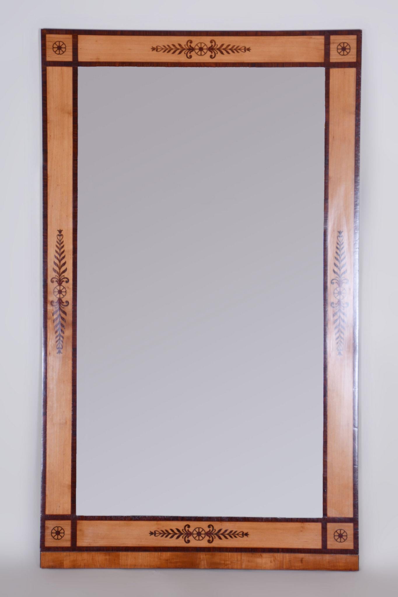 Biedermeier restored mirror in the frame

Period: 1830-1839
Source: Austria

Our professional refurbishing team in Czechia has fully restored it according to the original process. 
This item features classic Biedermeier elements. Visual simplicity,