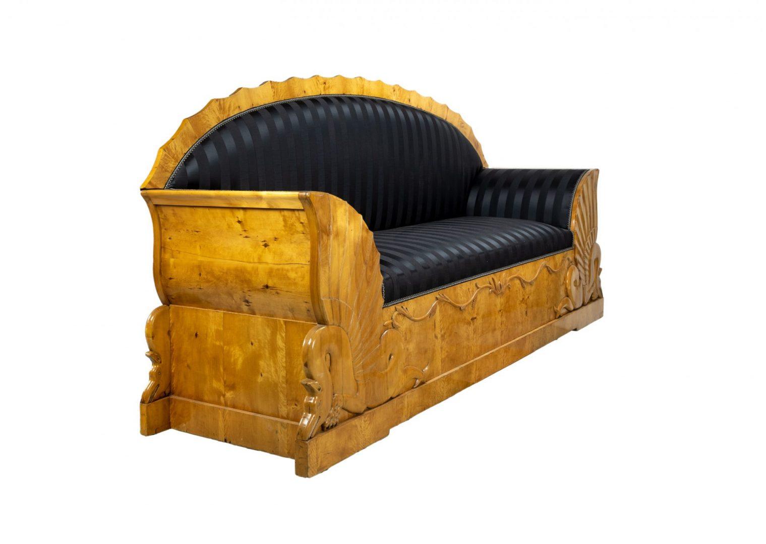 An early 19th century Biedermeier sofa, probably Scandinavian. The sofa is made using satin birch timber heavily carved to create winged serpents or dragons. Recently reupholstered in black striped fabric


The Biedermeier period refers to an era in