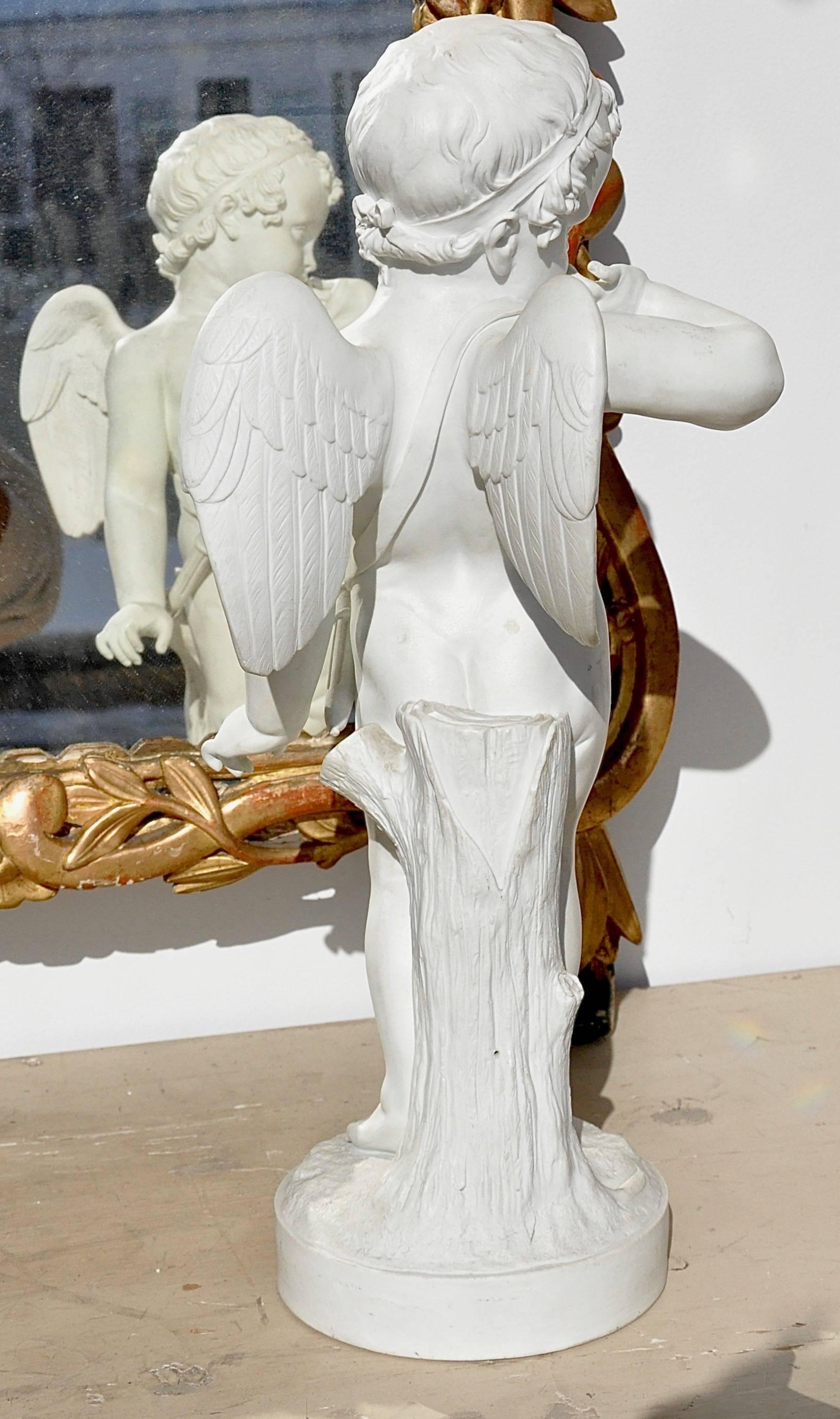 Large realistically sculpted bisque porcelain figure of cupid with arrows.

Attributed to the Paris Manufacturer, Dihl and Guerhard, which was patronized by Josephine Bonaparte
among others during the late 18th and into the early 19th century.
 