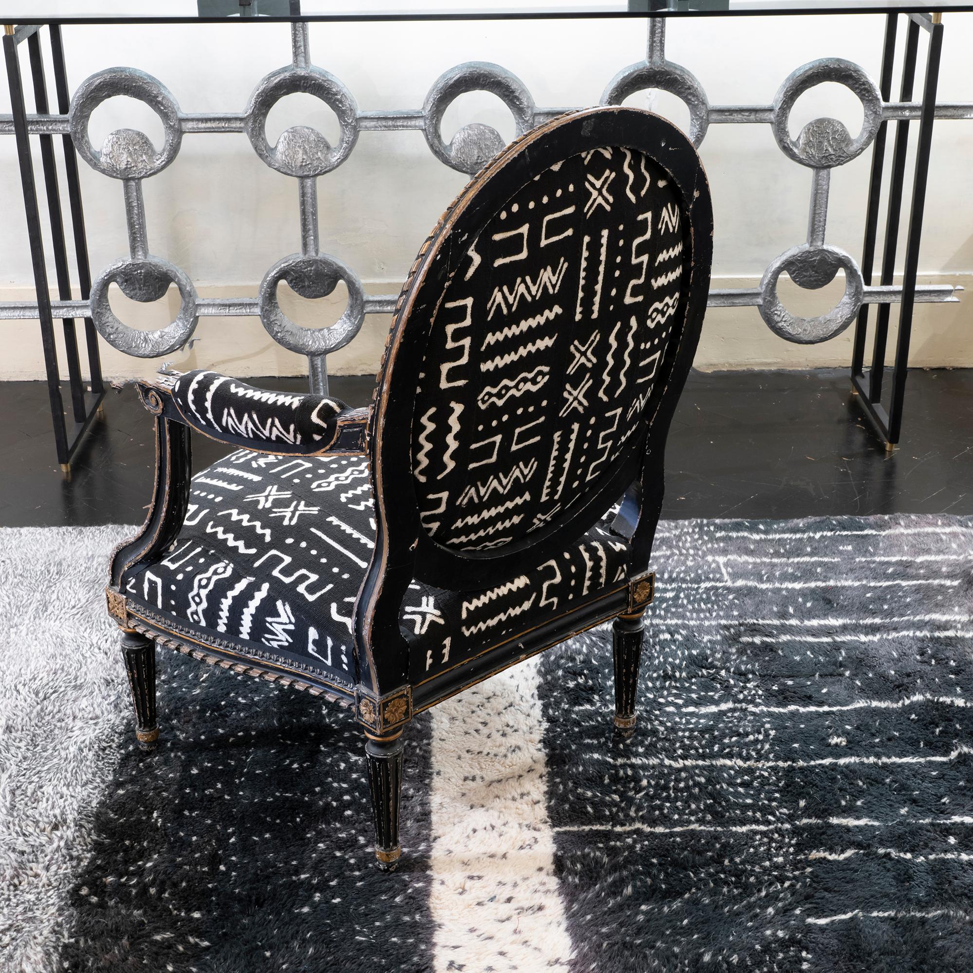 Blackened Early 19th Century Black and Gilded Armchair Black and White Ethnic Fabric