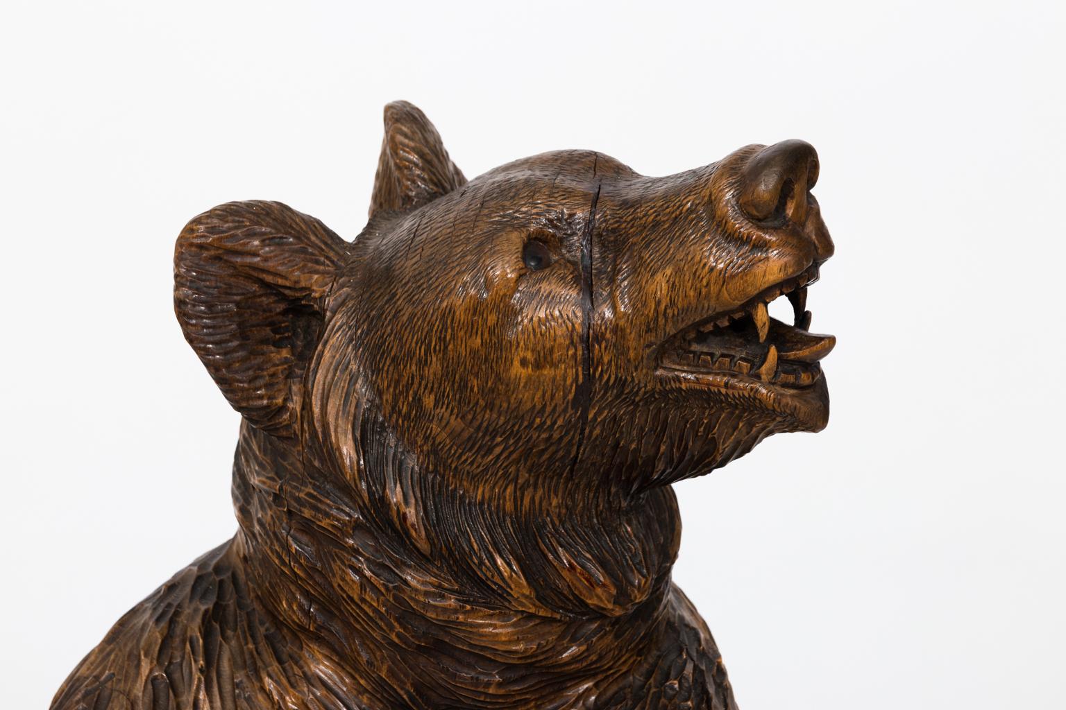 Early 19th Century Black Forest Carved Bear with Basket In Good Condition In Stamford, CT