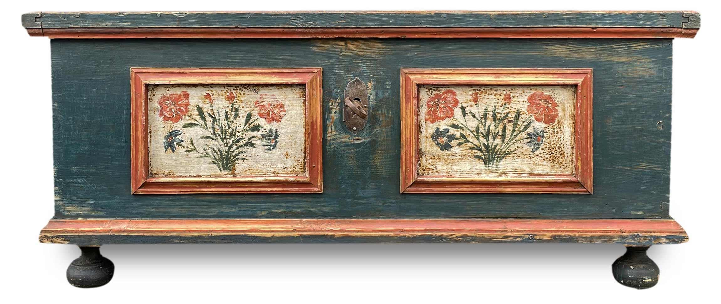 Blue Painted Chest

Measurements: H.52 – L.123 – P.61
Period: Early 19th century
Origin: Tyrol
Essence: Fir

Tyrolean painted chest entirely painted in teal blue. On the front there are two generous panels framed in red containing bouquets of