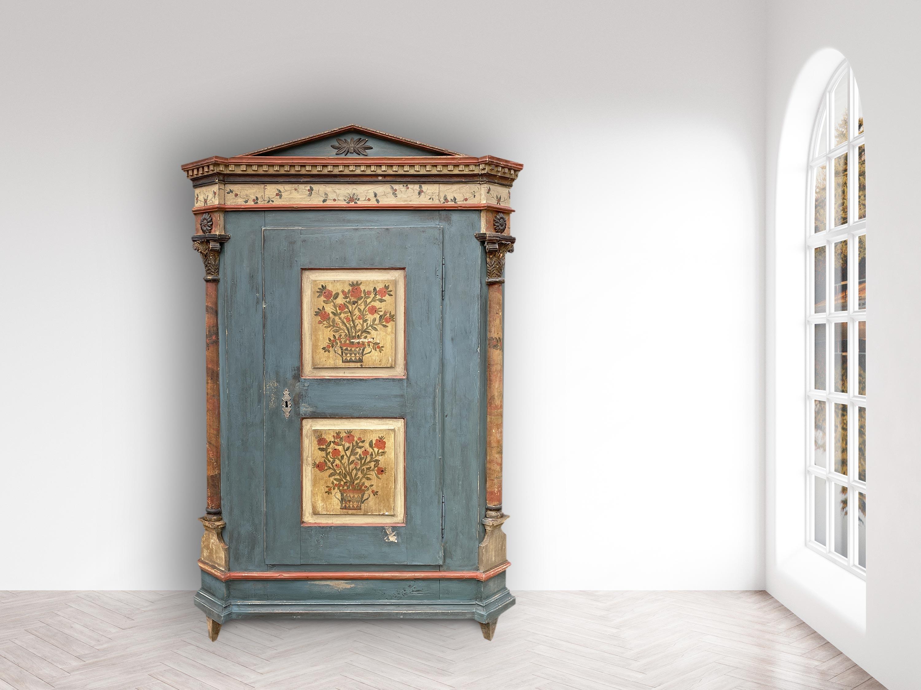 Austrian Early 19th Century Blu Floral Painted Cabinet with Tympanum