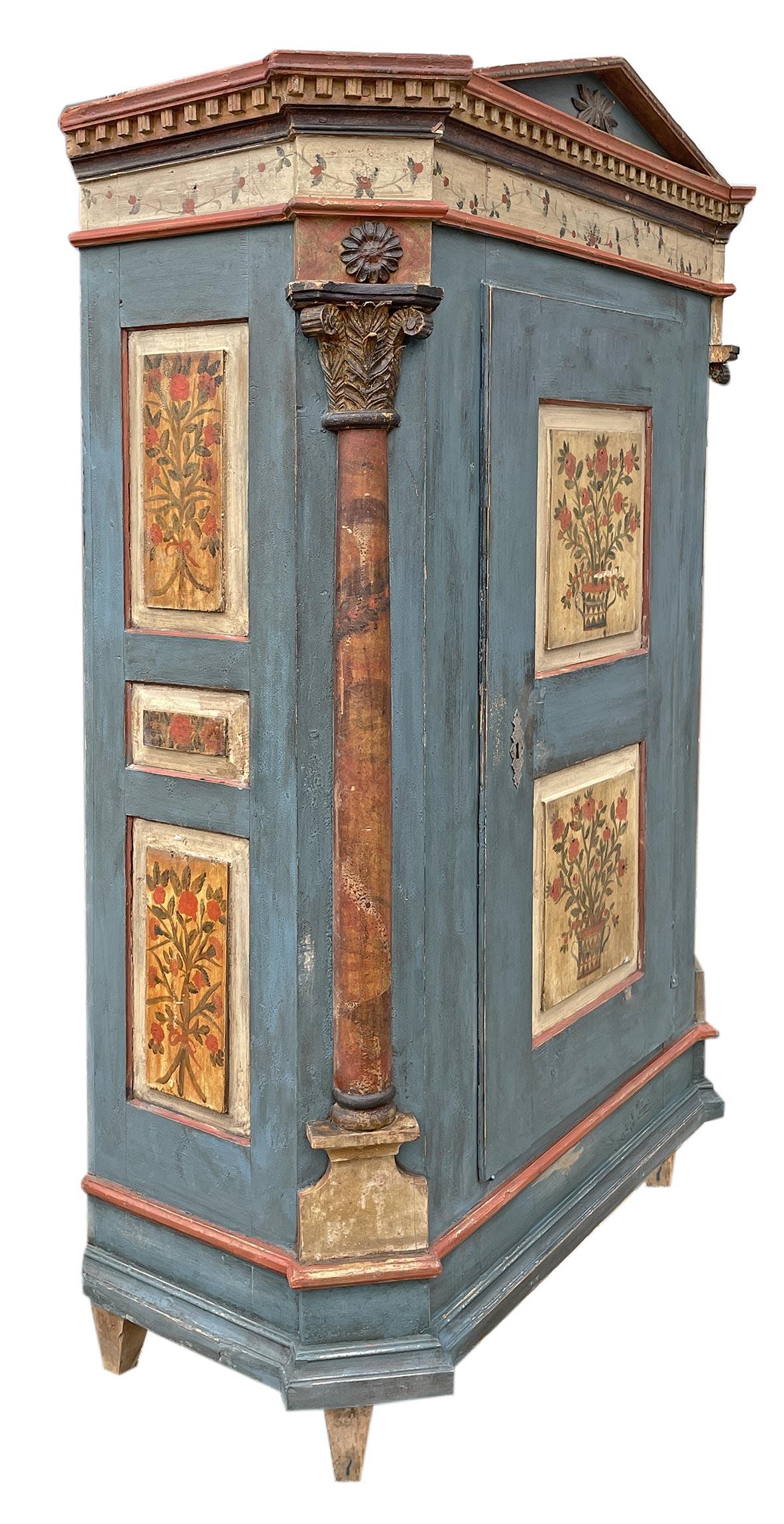 Hand-Carved Early 19th Century Blu Floral Painted Cabinet with Tympanum