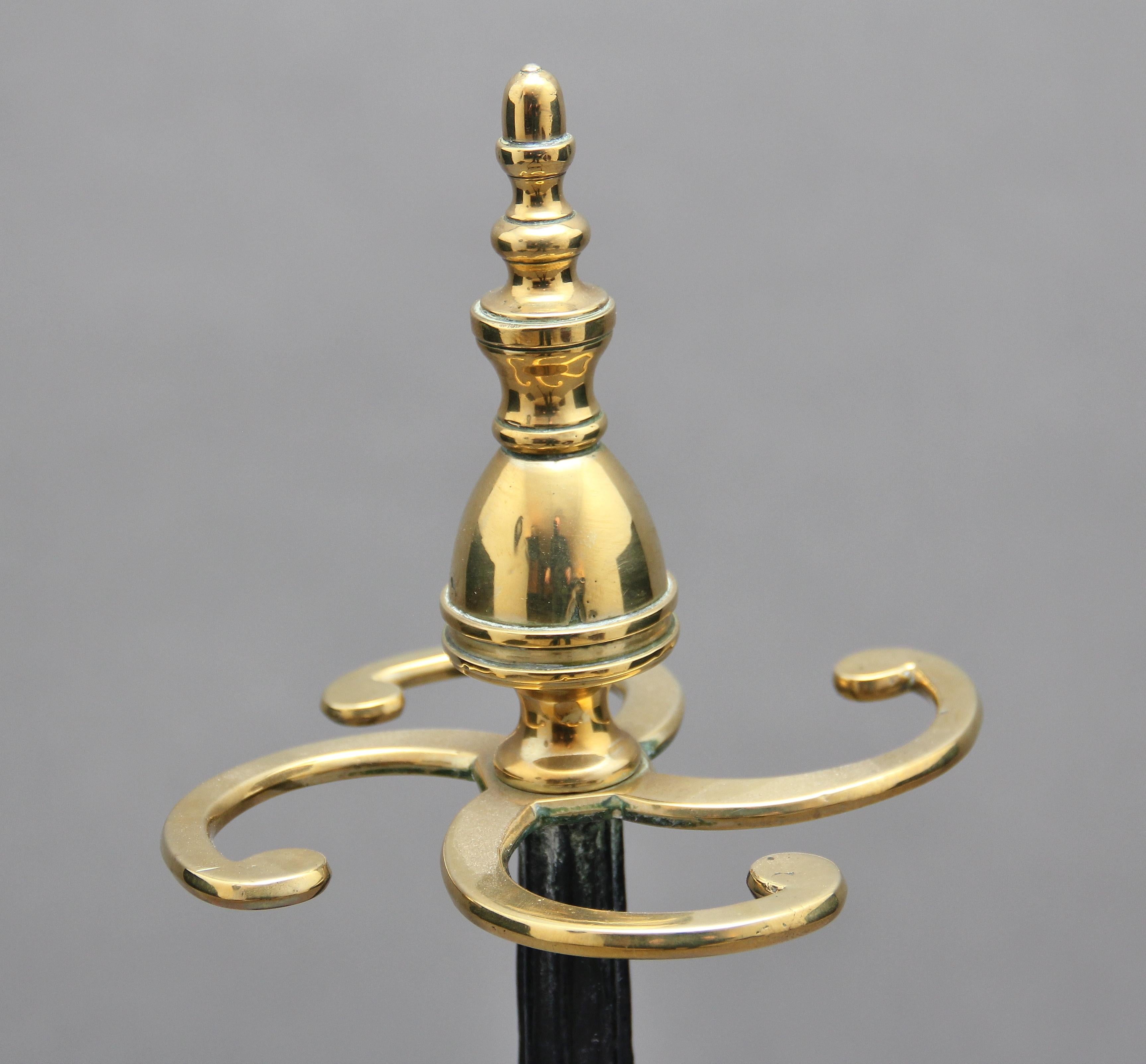 English Early 19th Century Brass and Cast Iron Stick Stand For Sale