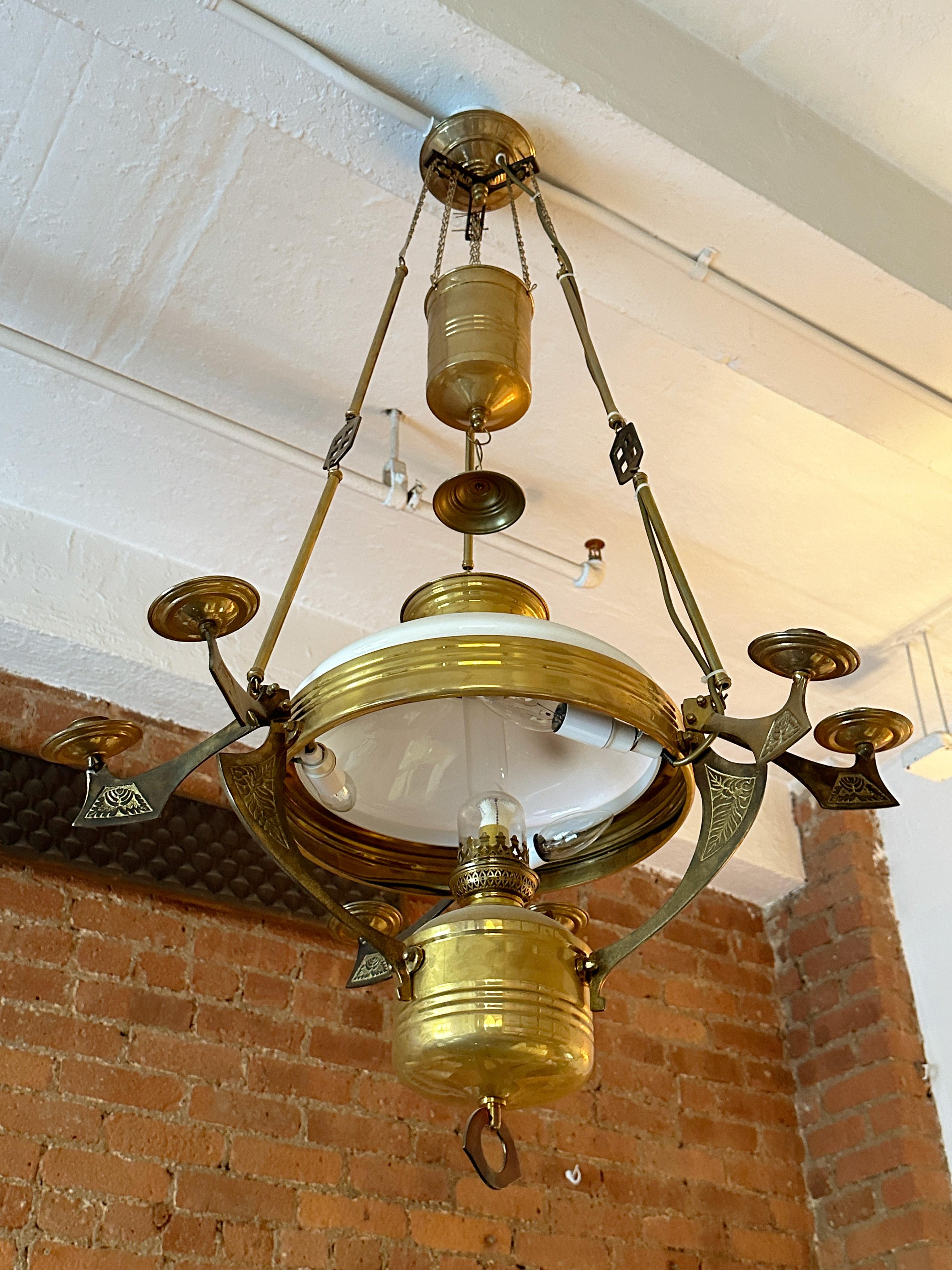 Early 19th century Sweedish chandelier reproduction. Beautifu pendant made of brass and white glass. Wired in working conditions. 

Property from esteemed interior designer Juan Montoya. Juan Montoya is one of the most acclaimed and prolific