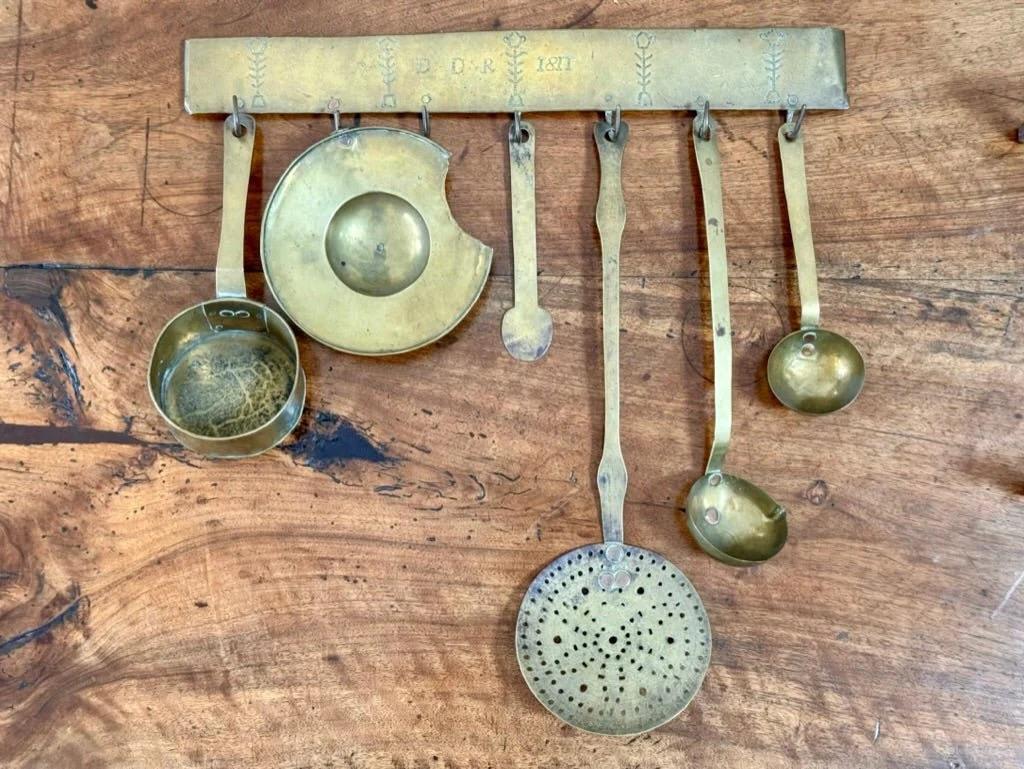 Early 19th Century Brass kitchen utensil hanger with utensils For Sale 1
