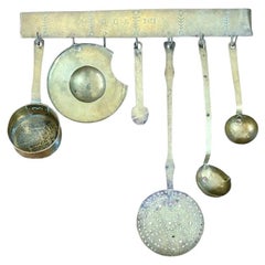 Antique Early 19th Century Brass kitchen utensil hanger with utensils