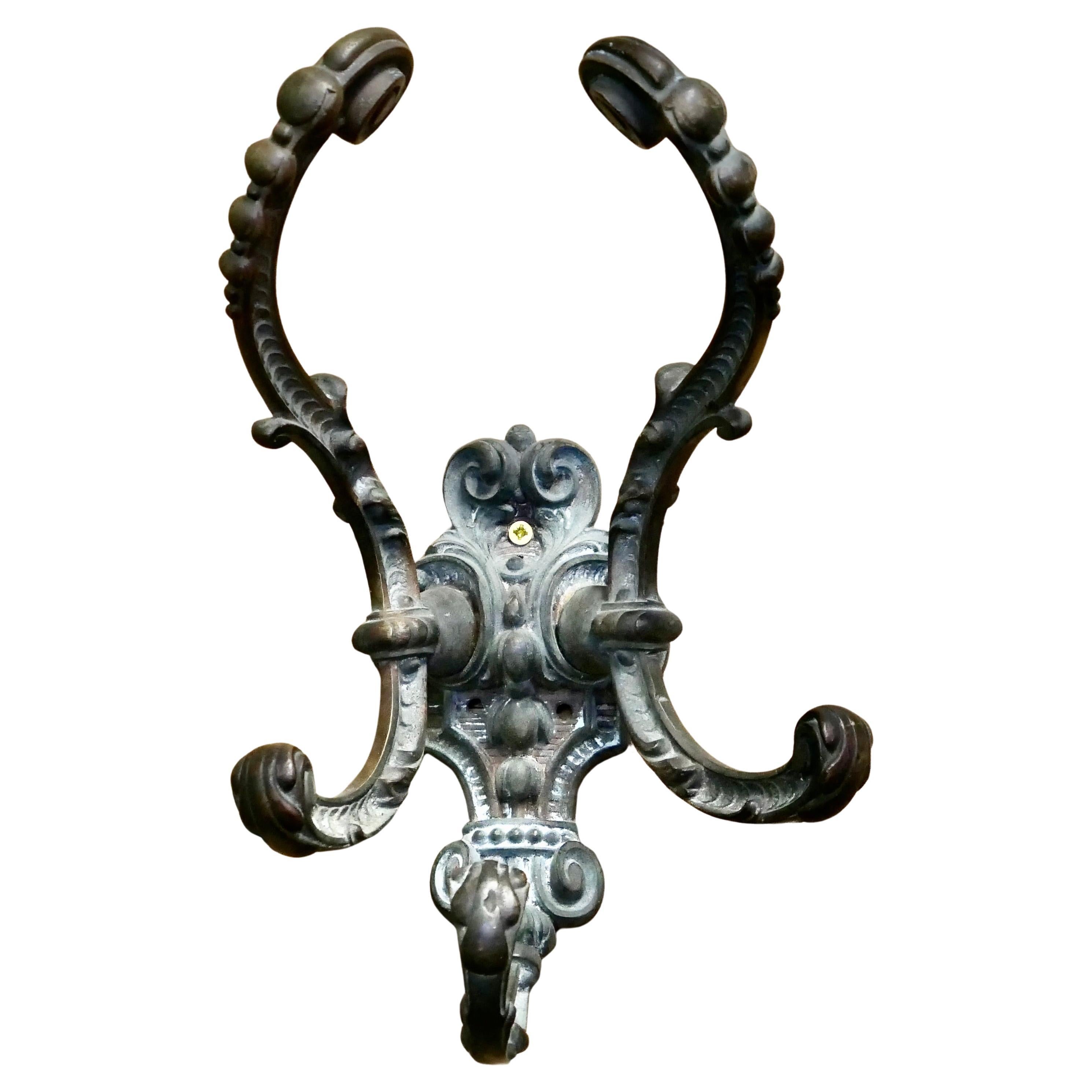 Perchas de bronce para sombreros y abrigos de principios del siglo XIX