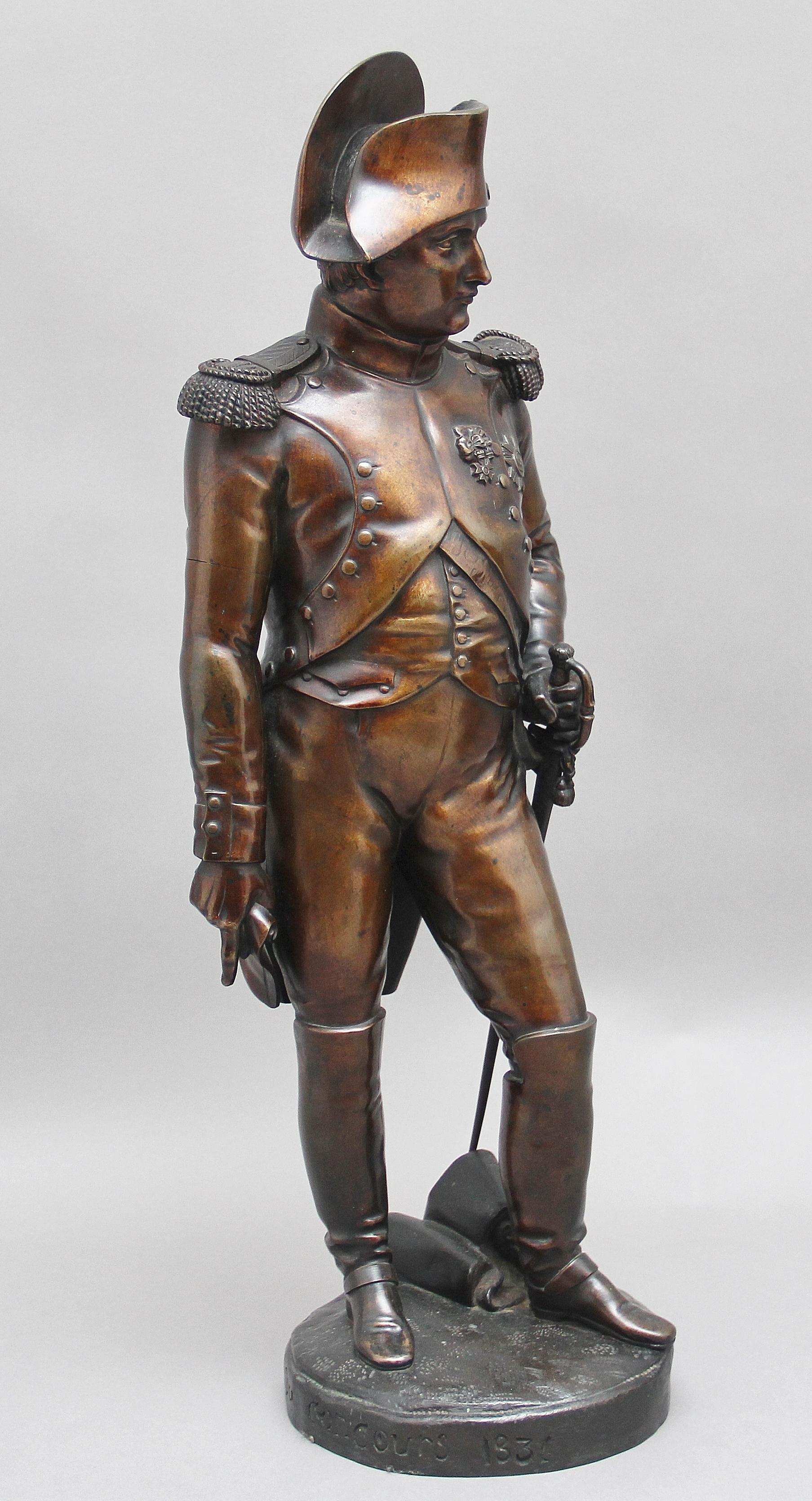 Early 19th century French bronze sculpture of Napoleon Bonaparte by Carle Elshoecht (1797-1856) and is dated and signed 1831.

This bronze has a fabulous patina and is in excellent condition, standing in uniform wearing a bicorn hat, waistcoat and