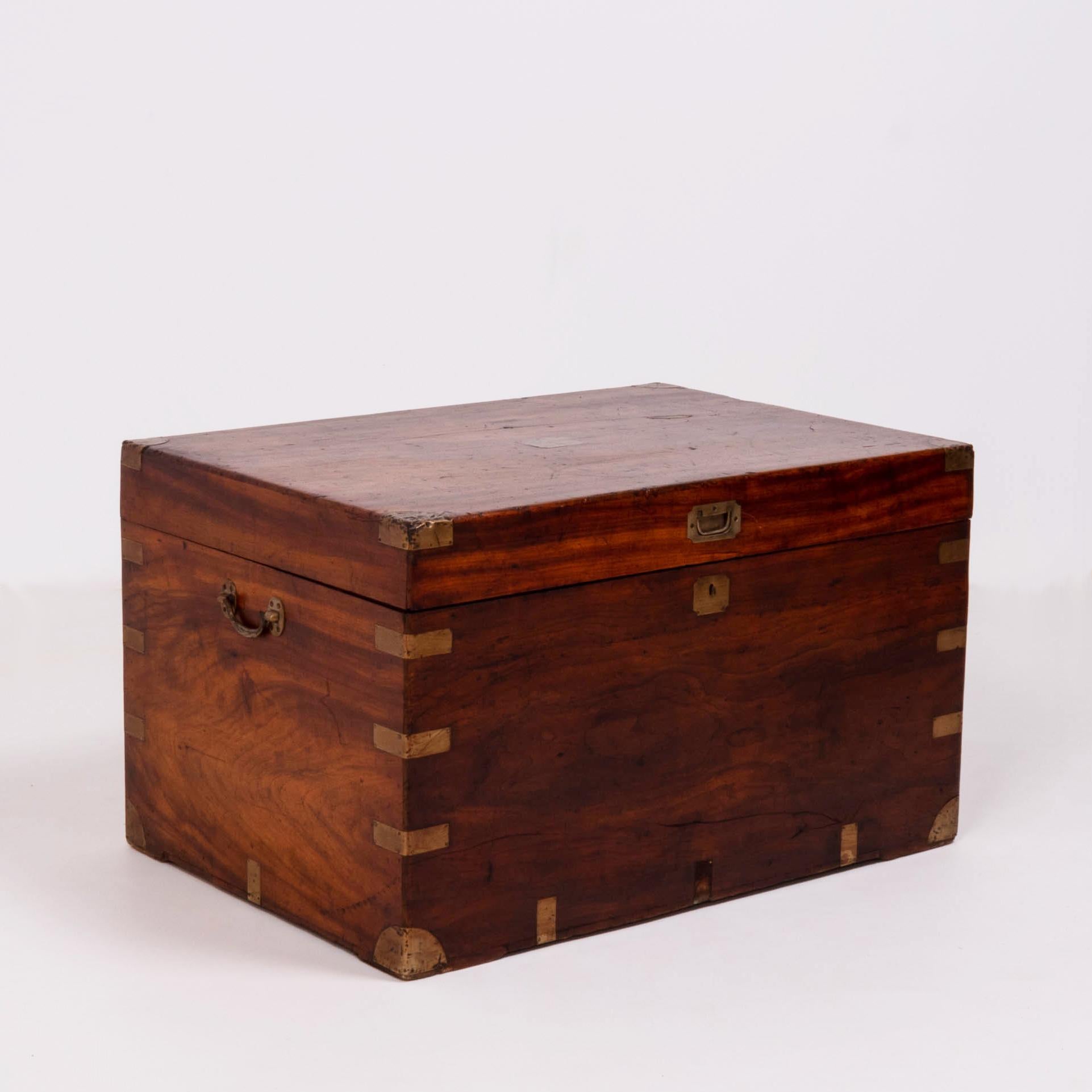 Crafted in the late 19th century by carpenter and cabinet makers AH FOO, this large chest is a beautiful example of craftsmanship.

Constructed from sturdy camphor wood, the chest has a hinged lid with a brass pull and two additional brass handles
