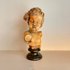 Early 19th Century Carved Angel Bust Head in Lime-Wood and Ebonized Turned Base