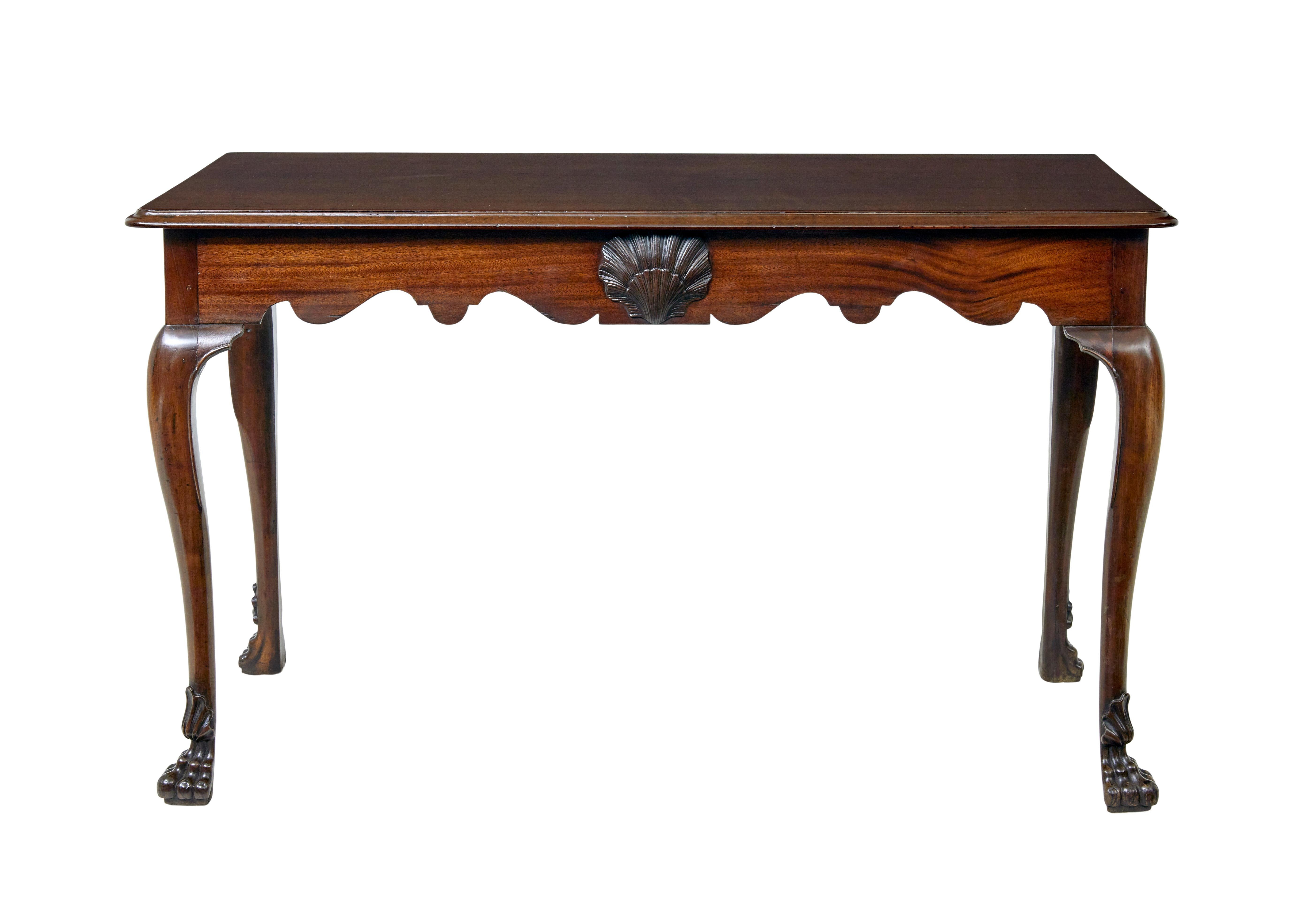 Early 19th century and later Irish serving table circa 1800

Fine quality Irish mahogany serving/side table. 1 piece solid top which has been re-finished and hand re-polished, finished with a moulded edge. Shaped freize with applied hand carved