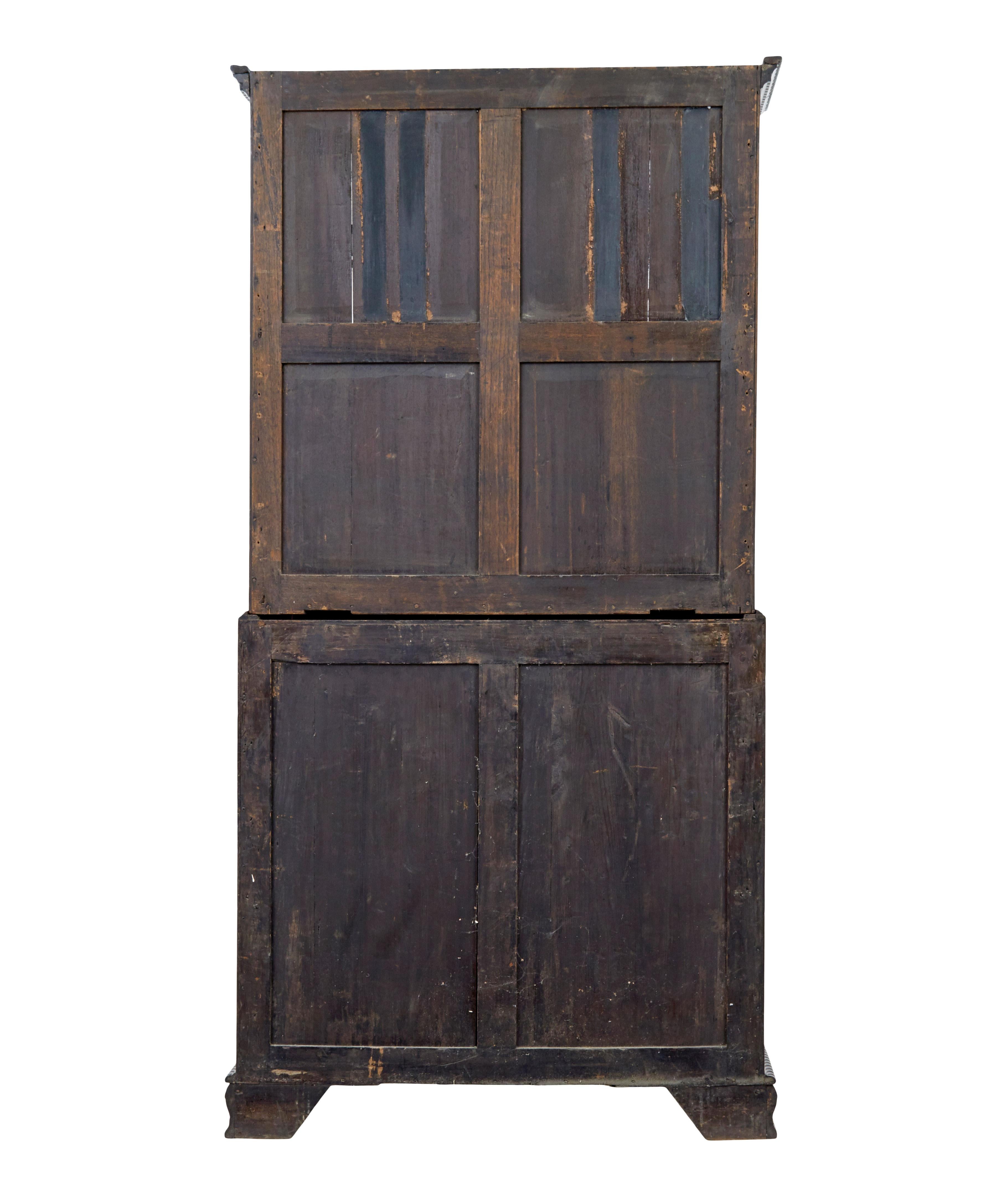 Glazed Early 19th century carved mahogany bureau bookcase For Sale