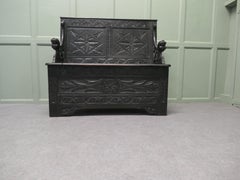 Early 19th Century Carved Oak Box Settle The Settle has carved geometric design