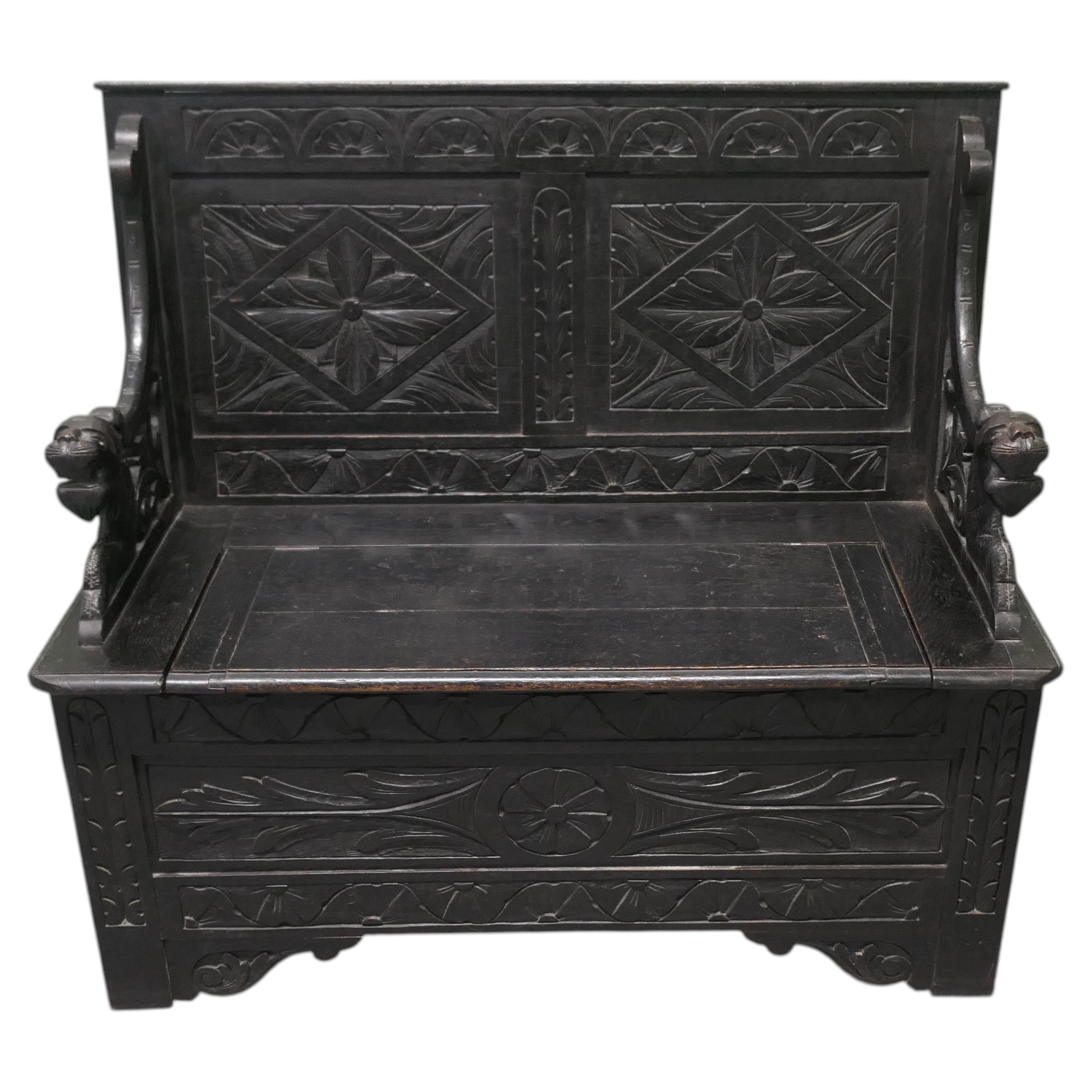 Early 19th Century Carved Oak Box Settle The Settle has carved geometric design