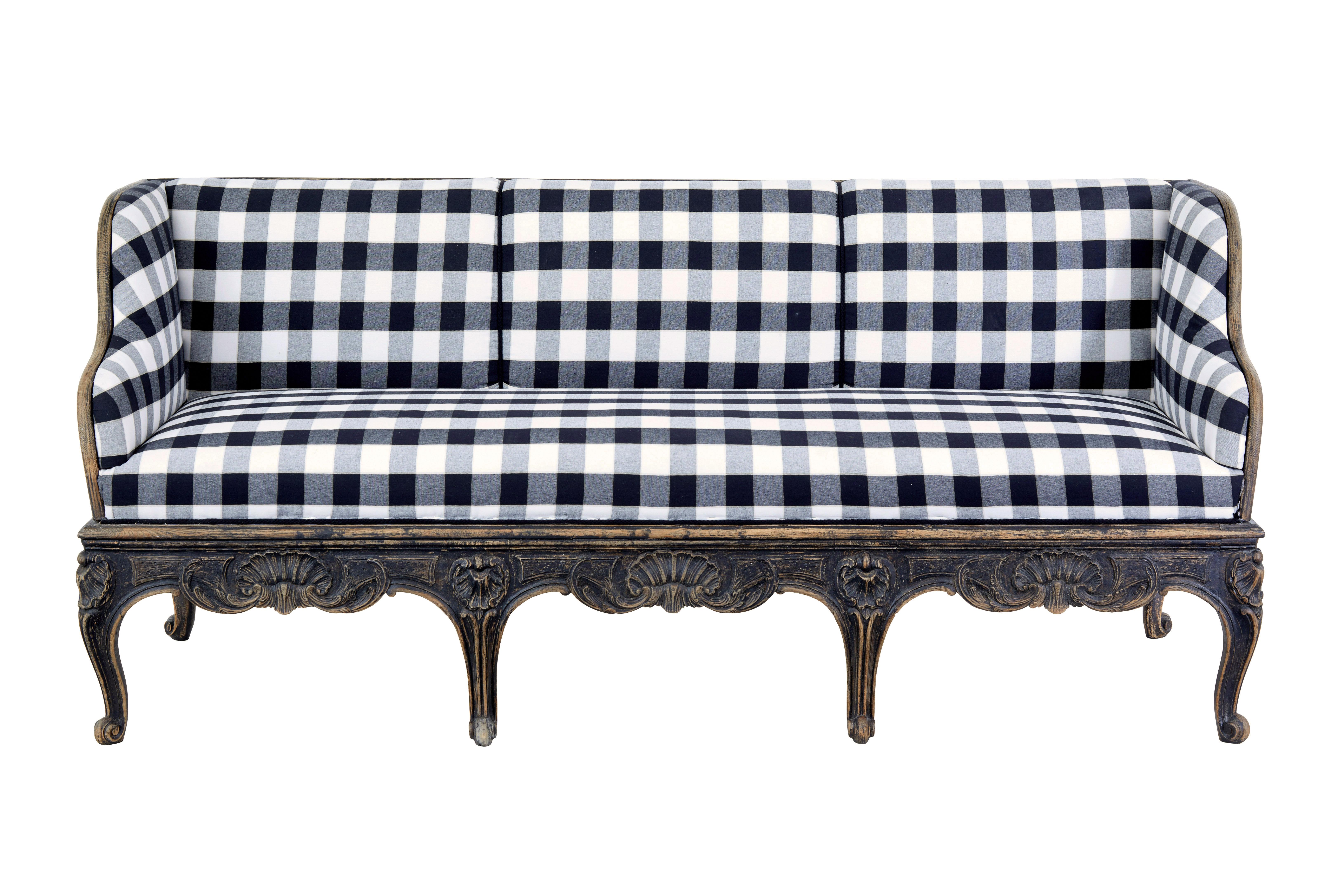 Early 19th century carved oak Swedish painted sofa, circa 1820.

Rare and stunning piece of period Swedish furniture.  3 seat sofa which has recently been re-covered in black/grey and white check fabric.

Shaped sides with diamond shape pattern
