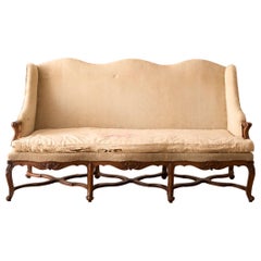 Early 19th century carved stretcher French settee