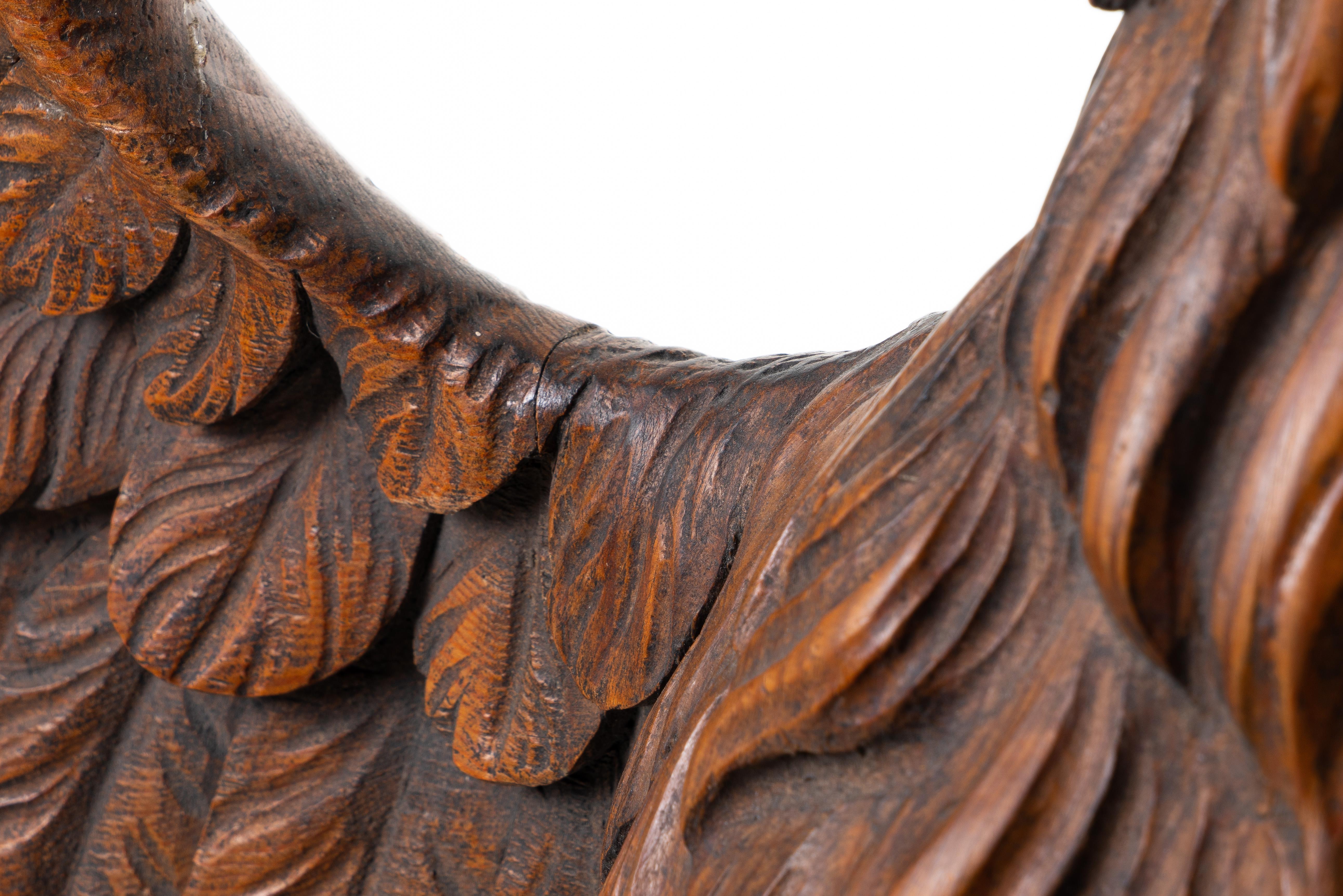 carved wooden eagle statue