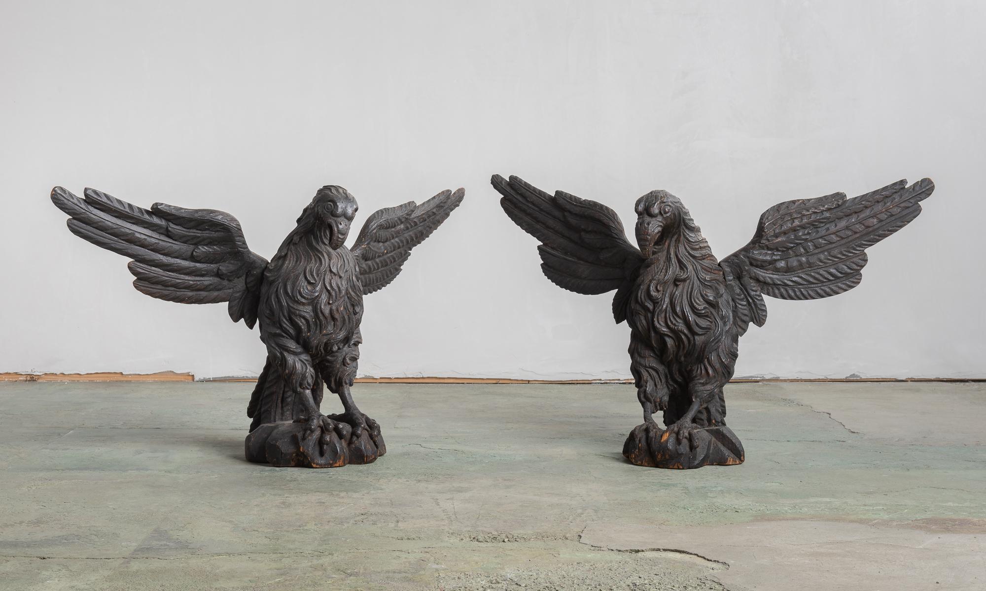 Early 19th century carved wooden eagles.

Boldly and beautifully carved wooden eagles from Nantucket Mass.