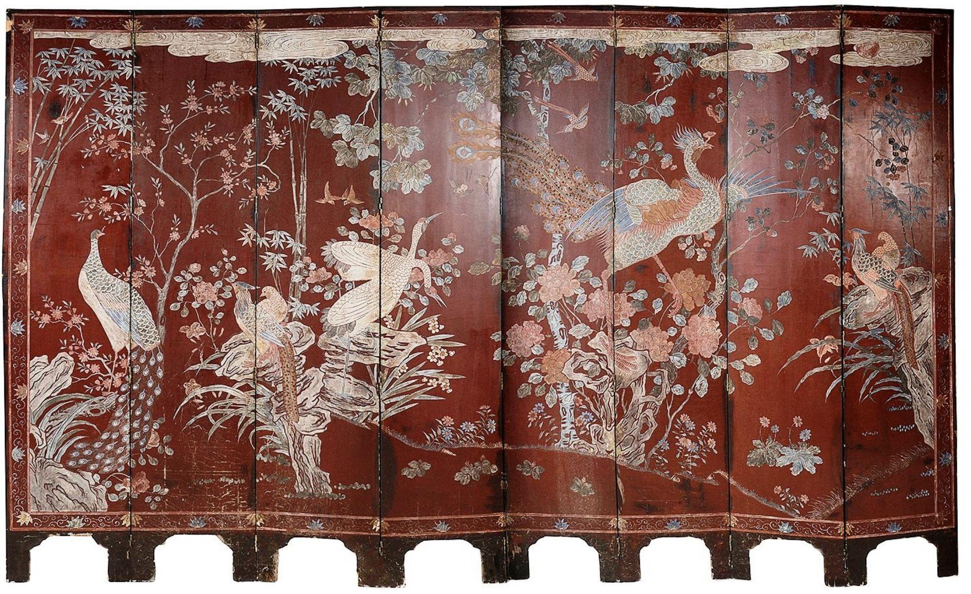 A very impressive early 19th Century Chinese Coromandel lacquer eight fold screen, depicting courtiers and attendants in pagoda buildings and gardens. set in a boarder of flower pots, vases and vessels. The reverse side having an equally decorative