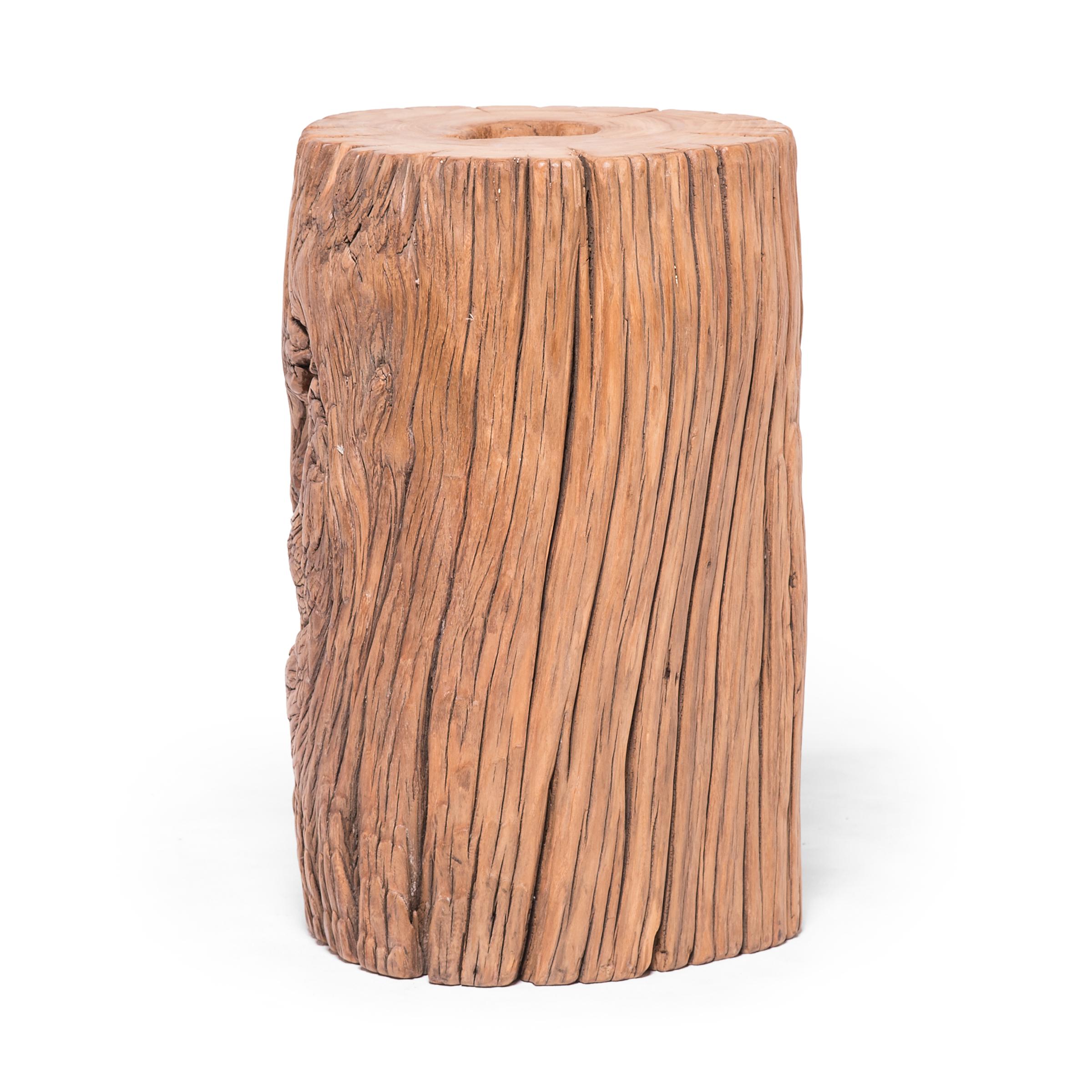 This beautifully weathered piece of elmwood is actually a portion of a support beam that once bolstered a Qing-dynasty building. A beautiful cross-section showcases the timber's growth rings, and a century of weathering has cloaked the wood's raw
