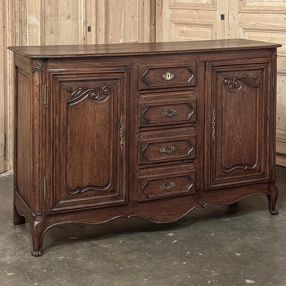 Early 19th Century Country French Buffet ~ Sideboard is an ingenious design for an average sized family!  Two tall, spacious cabinets on each side flank a center section comprised of four drawers, allowing one to store everything needed for dining