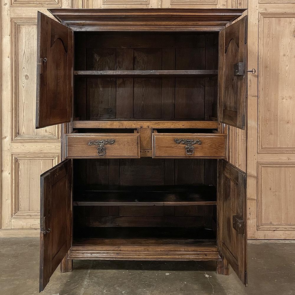 Early 19th Century Country French Four Door Wardrobe In Good Condition For Sale In Dallas, TX