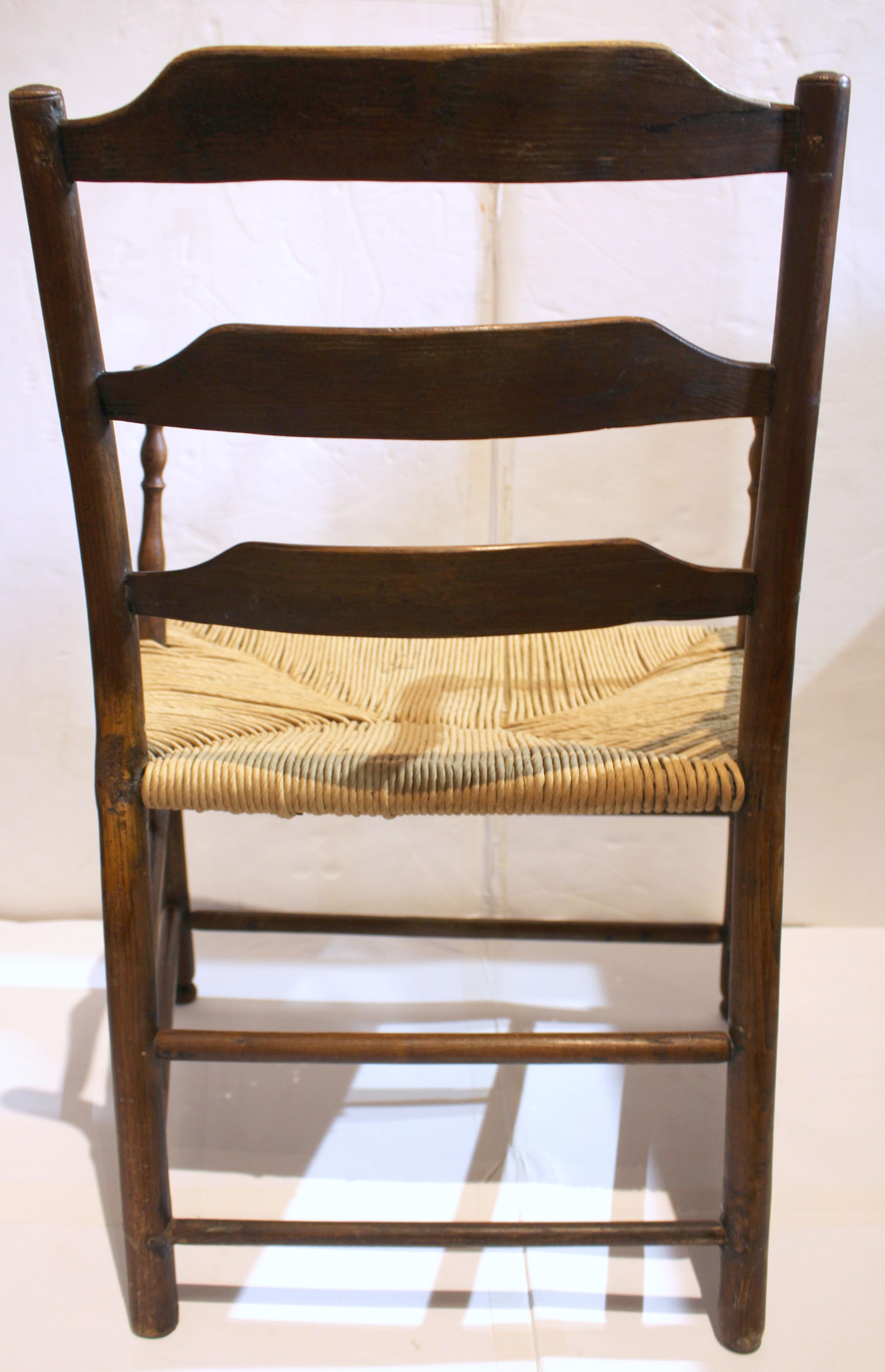 Early 19th Century Country French Ladder-Back Arm Chair In Good Condition For Sale In Chapel Hill, NC