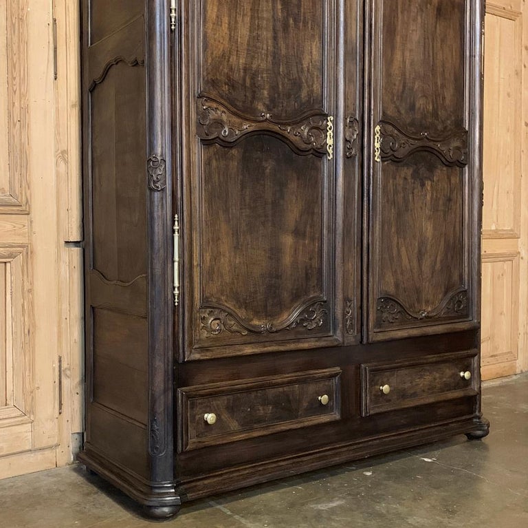 Early 19th Century Country French Provincial Walnut Armoire For Sale at