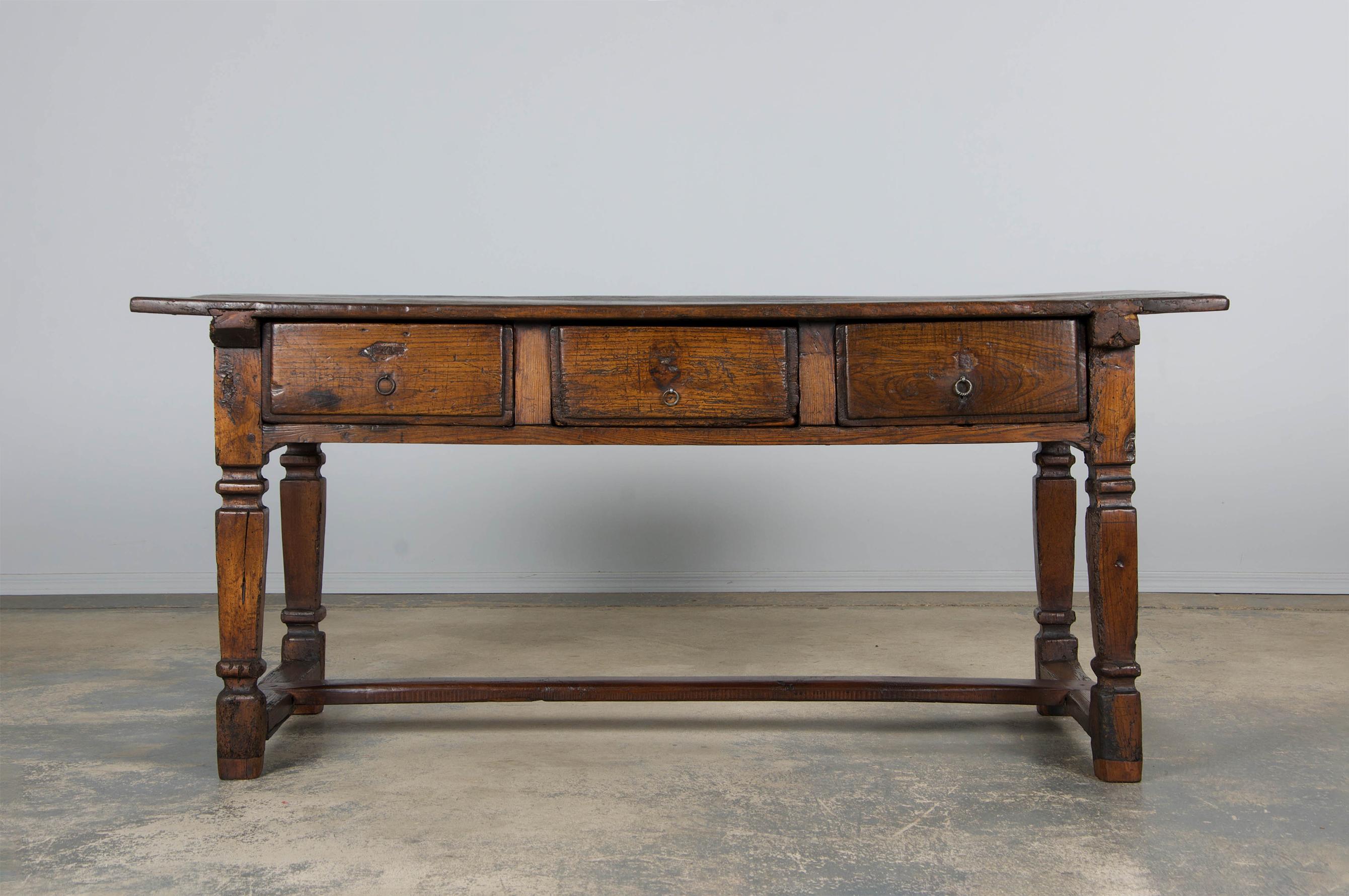 Monumental early 19th-century French Provincial kitchen island or large work table, sourced from Provence. Hand-carved from solid oak, it features a 5'9