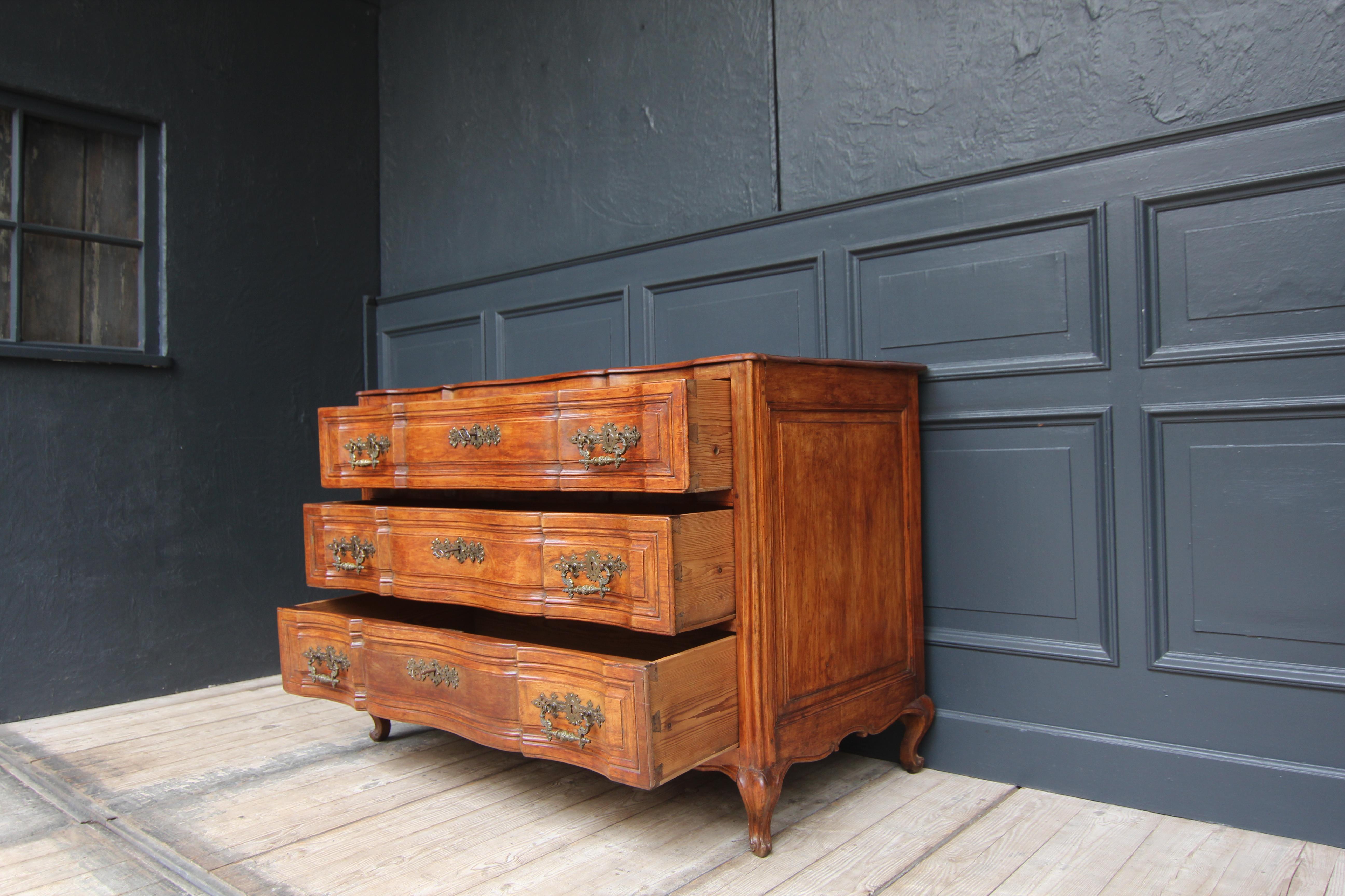 French Early 19th Century Curved Cherry Wood Chest of Drawers For Sale