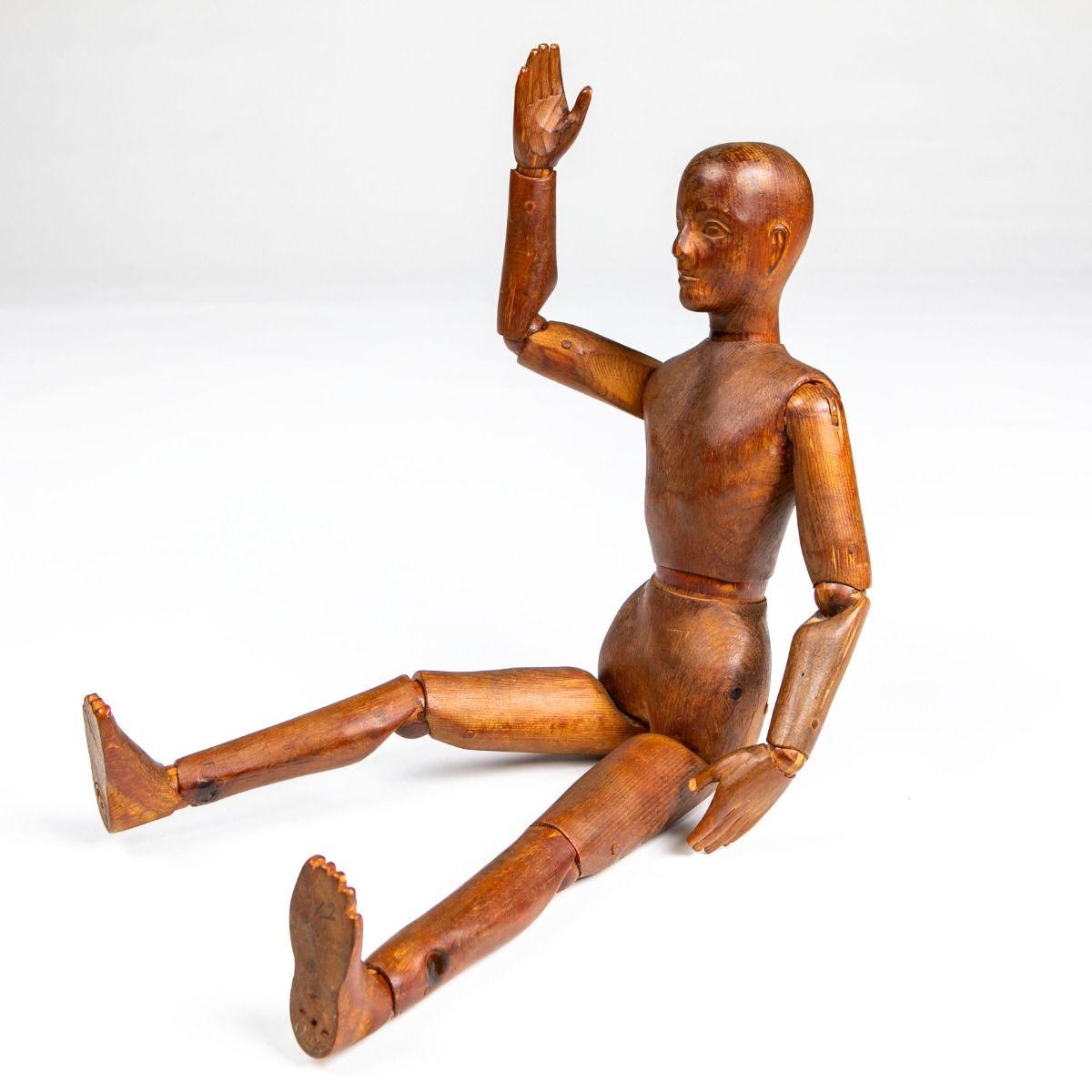 Beautifully crafted, large articulated artist’s mannequin made from pine wood, dating from the early 19th century.

It features jointed limbs and remains in its original condition, with a richly patinated surface that has developed naturally over