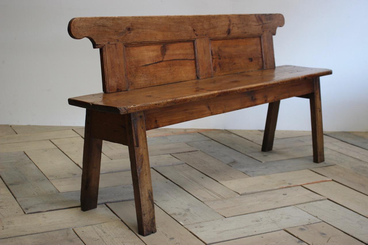 A very unusual and with a superb patina, early 19th century Danish hall bench in pine.