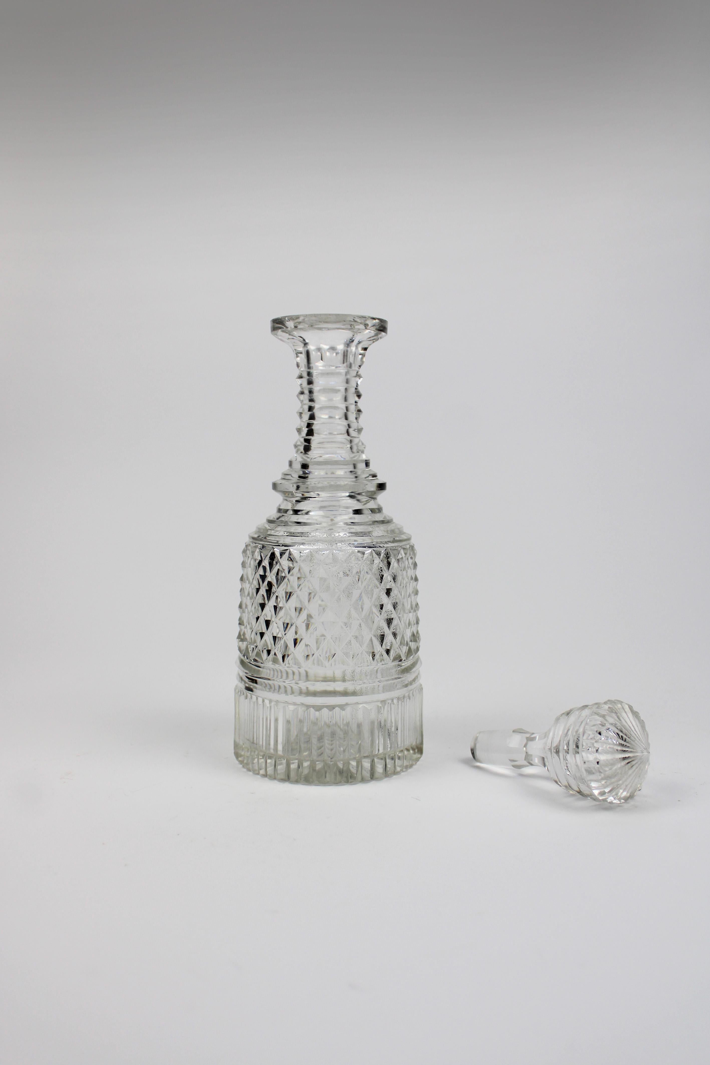 Presenting an exquisite Early 19th Century Diamond Cut Small Crystal Decanter from the renowned Cristallerie Voneche in Belgium. This handcut crystal decanter showcases the exceptional craftsmanship and elegant design that Voneche was celebrated