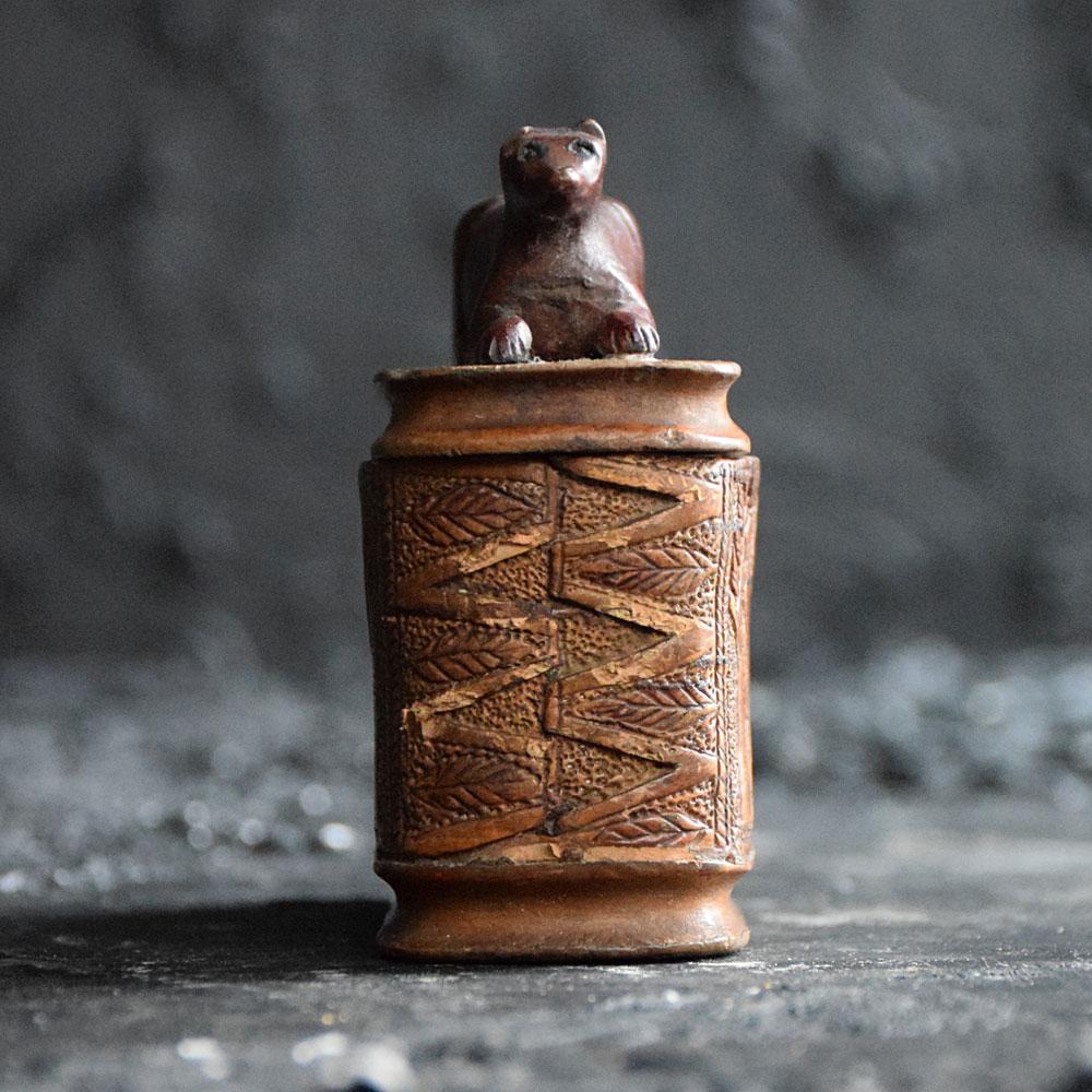 Early 19th century dog snuff box
We are proud to offer a rare and highly collectable example of an early 19th Century folk art dog snuff box. The outside of the box displays a group of carved figures sharing drinks at a table, a male and female